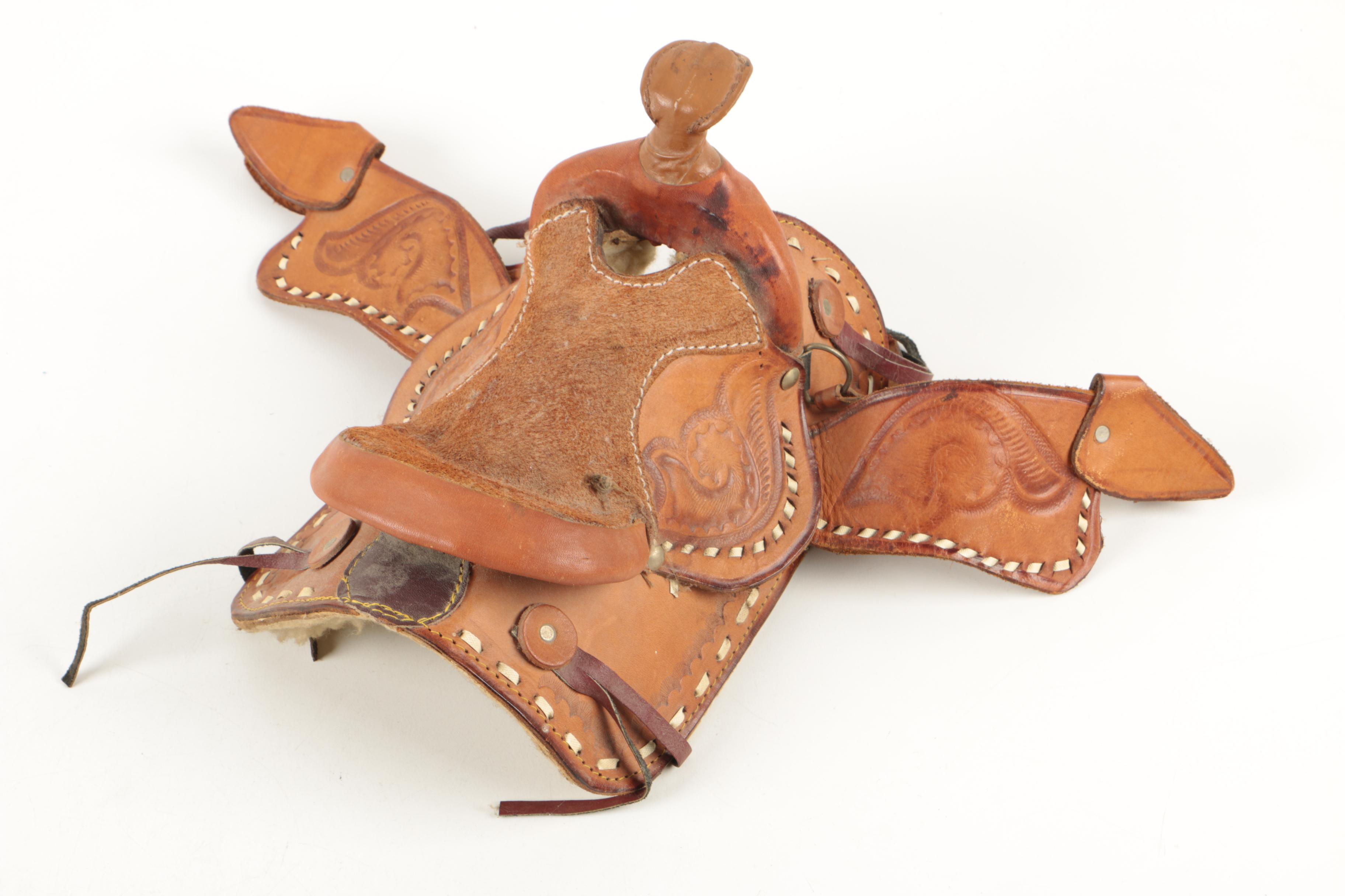 Miniature Tooled Leather Western Saddle, Rowel Spurs and Decorative Powder Horn
