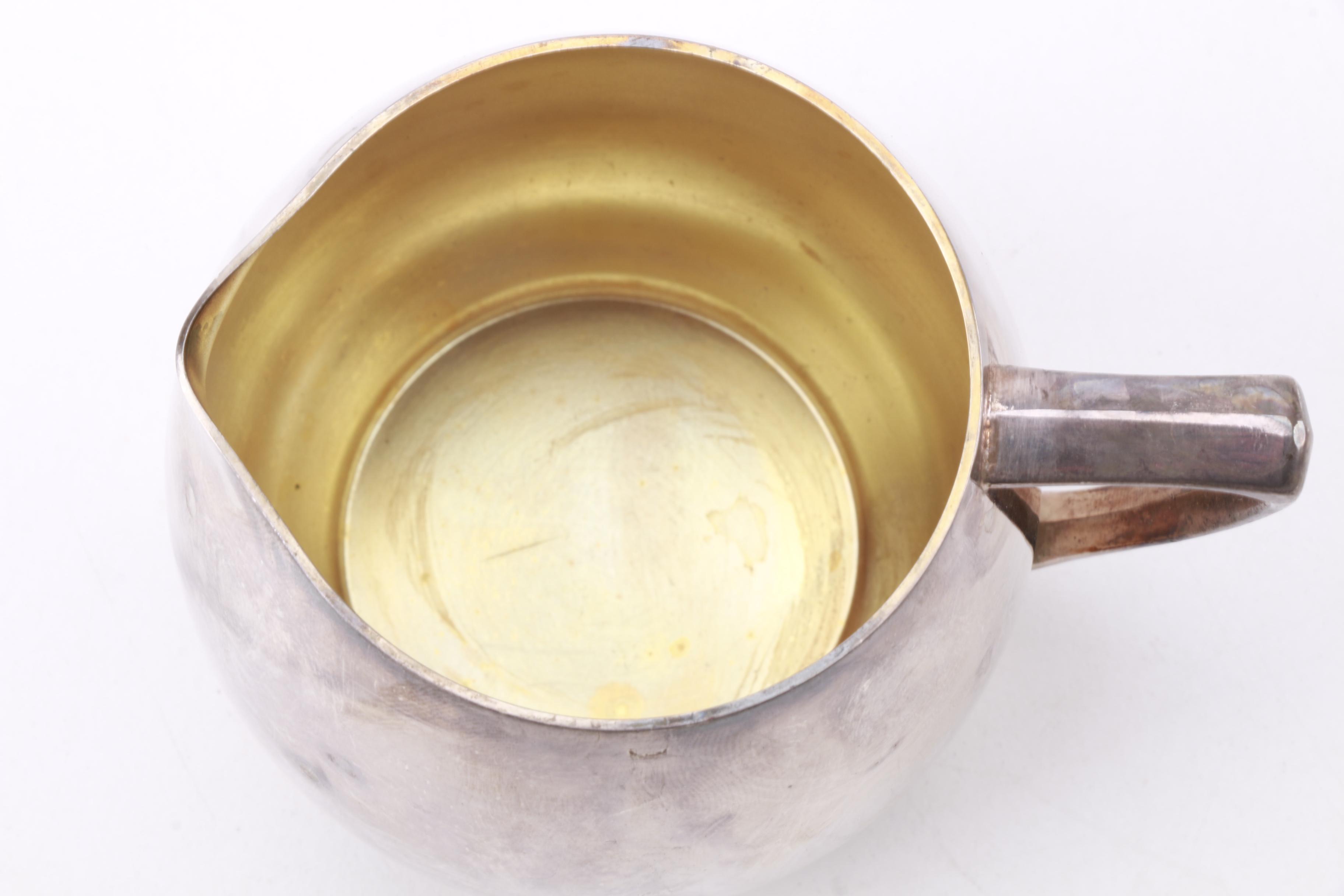 Wm Rogers Silver Plate Coffee Pot with Other American Silver Plate Servingware