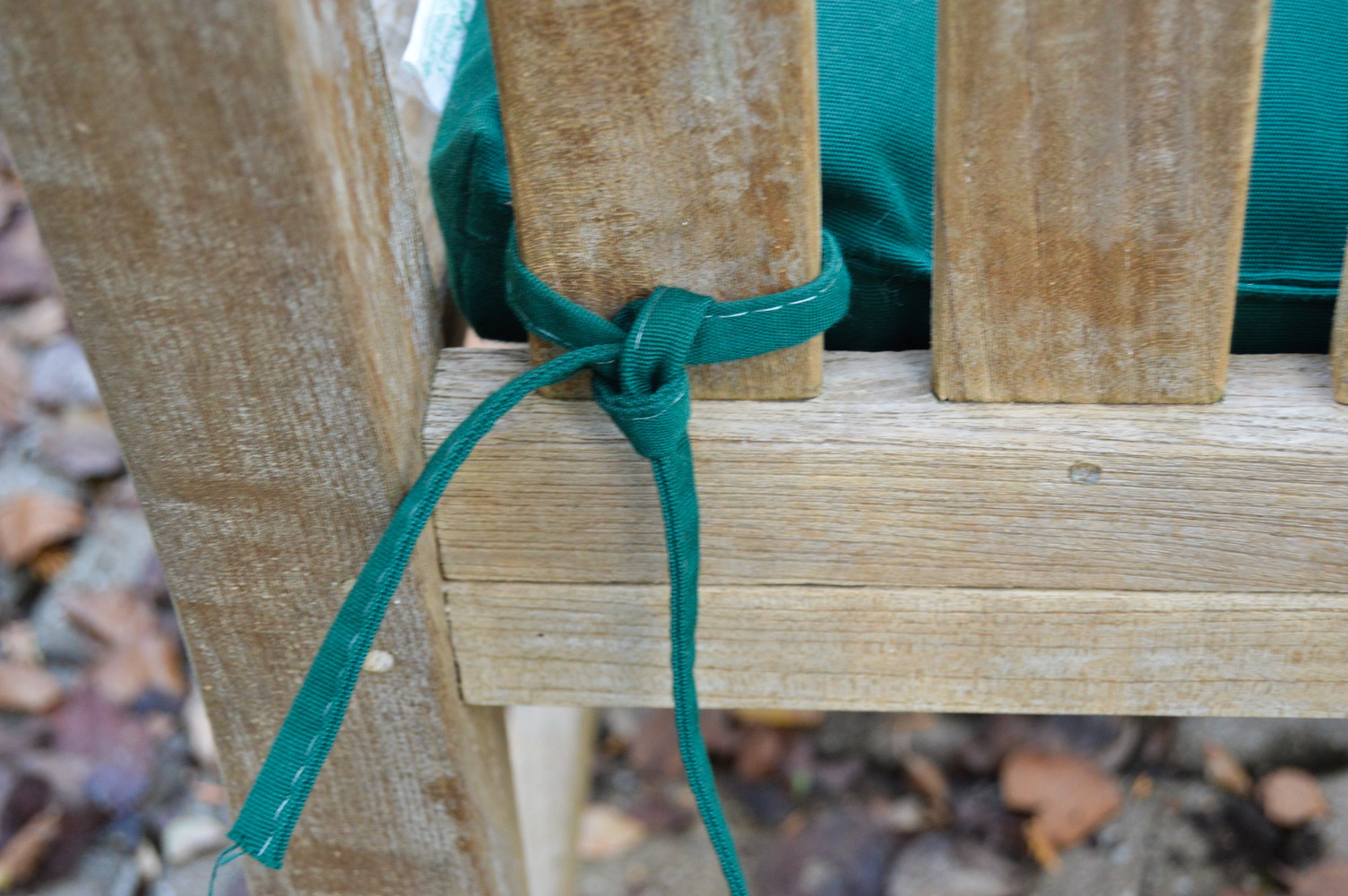 Unfinished Wood Garden Bench with Green Cushion
