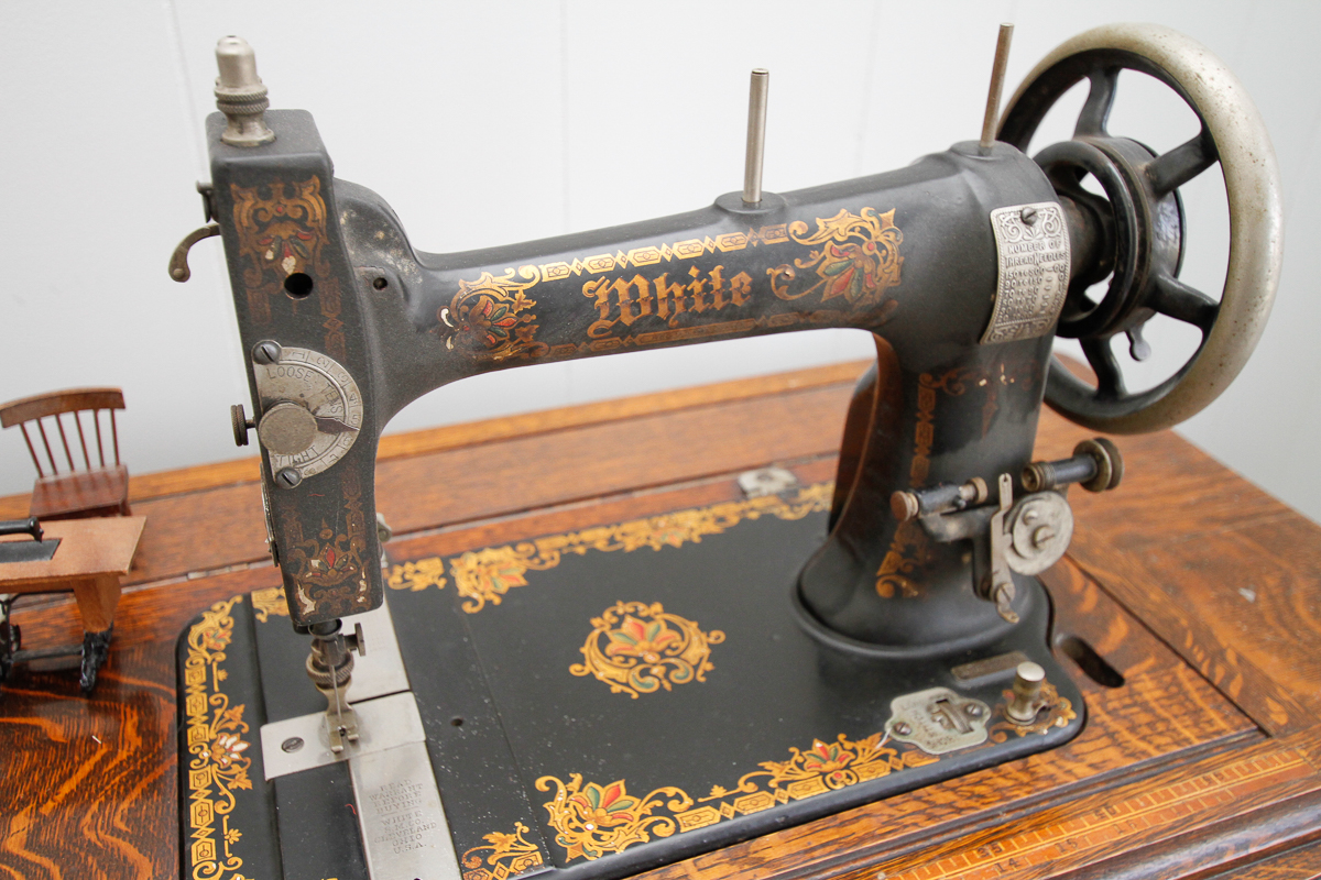 Antique Oak Sewing Table with White Sewing Machine