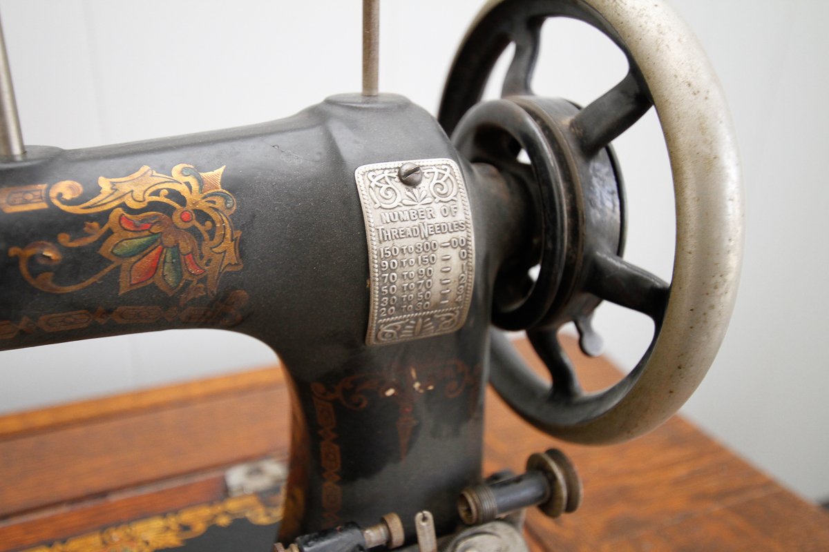 Antique Oak Sewing Table with White Sewing Machine