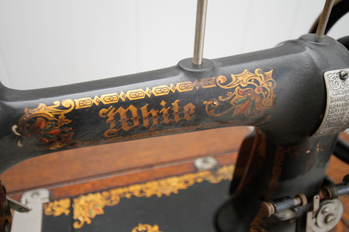 Antique Oak Sewing Table with White Sewing Machine