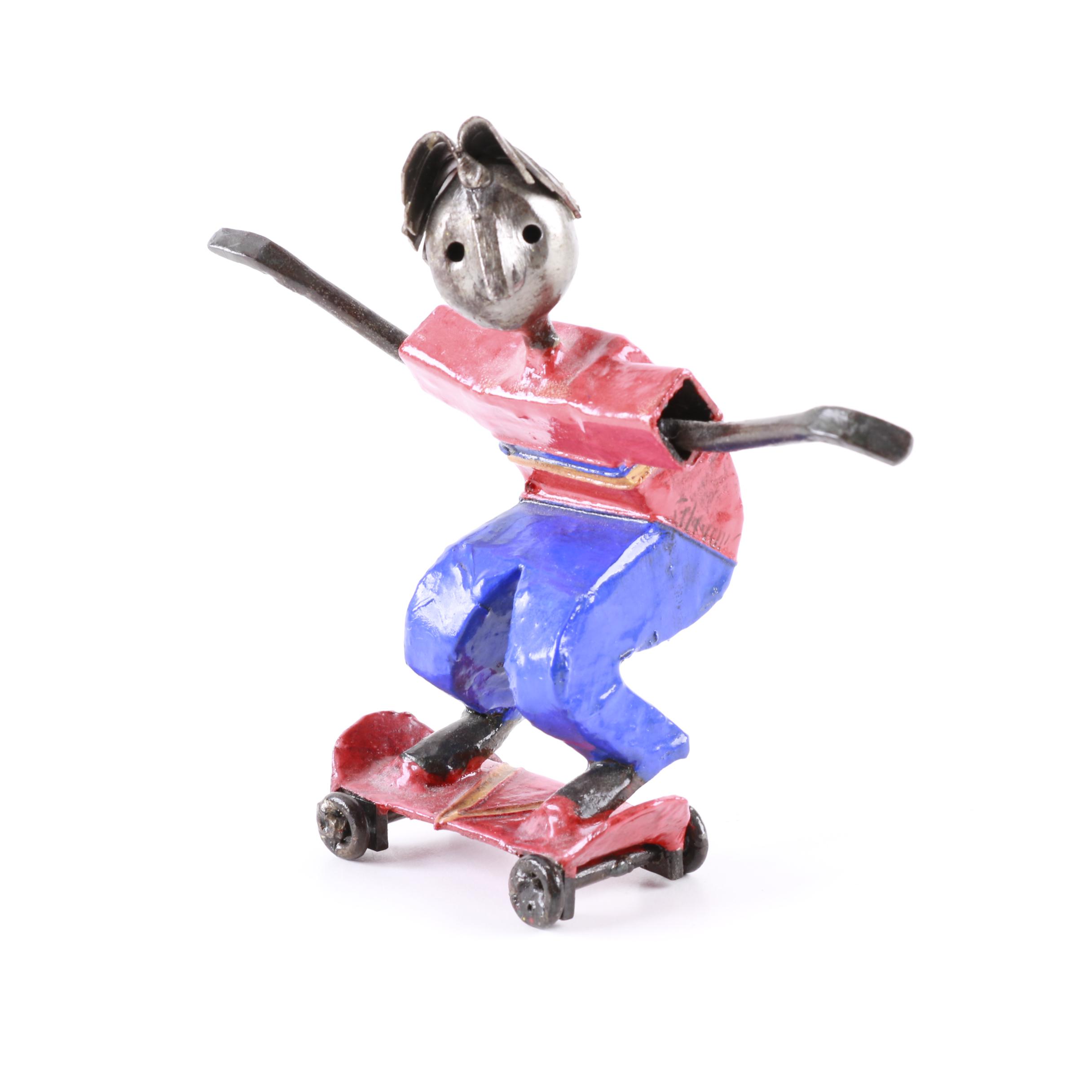 Metal Skateboarder Figurine