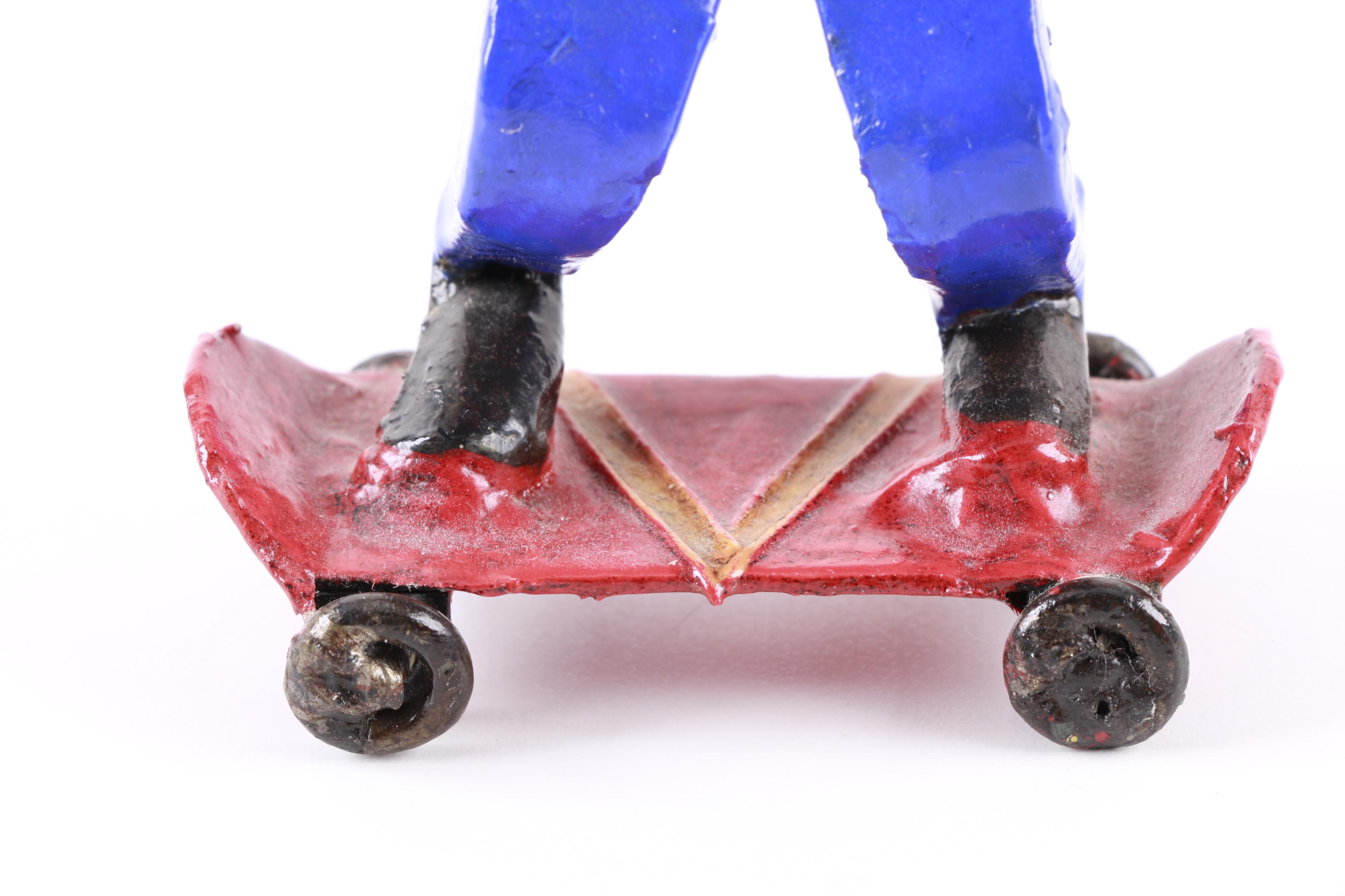 Metal Skateboarder Figurine