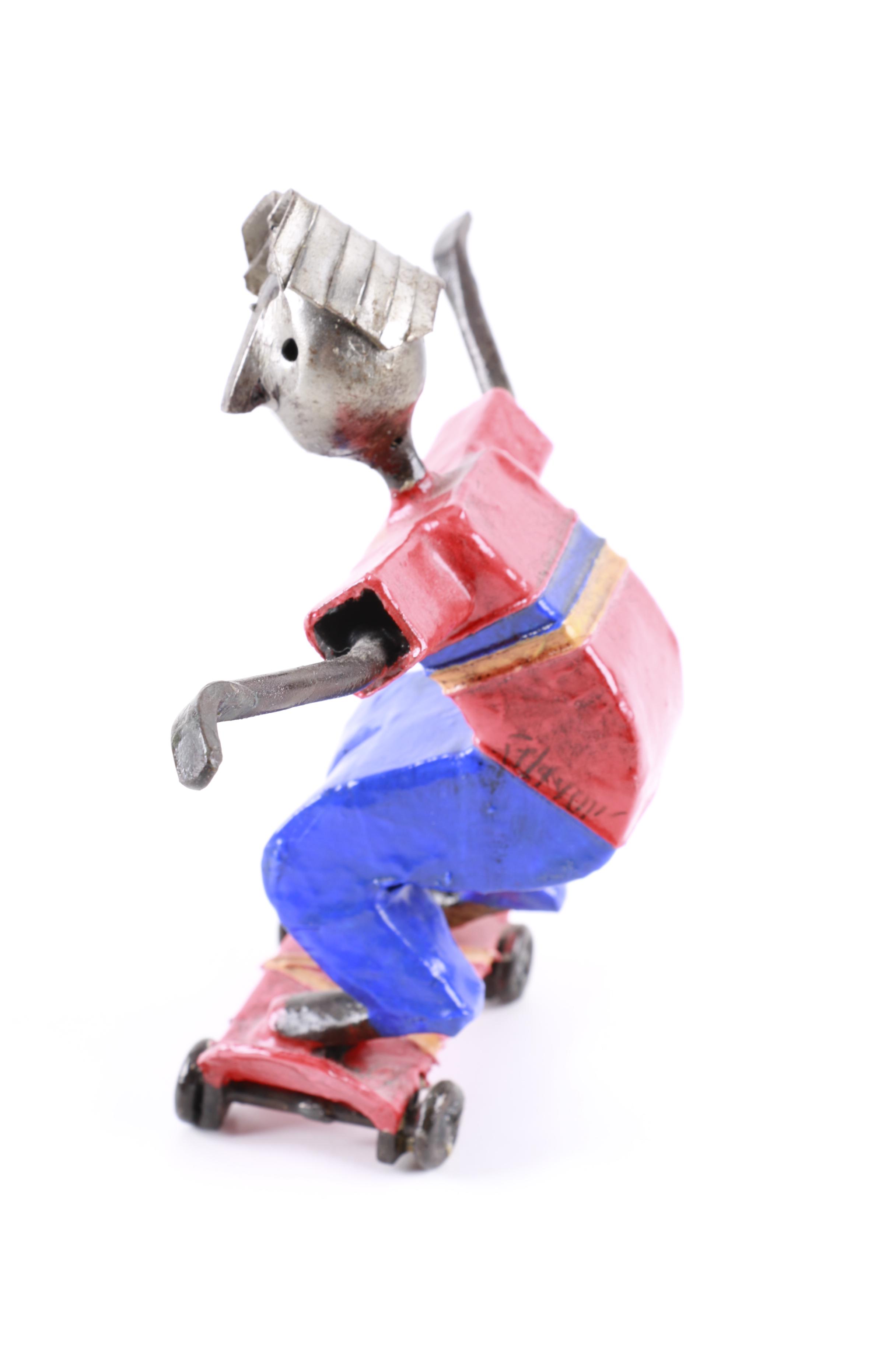 Metal Skateboarder Figurine