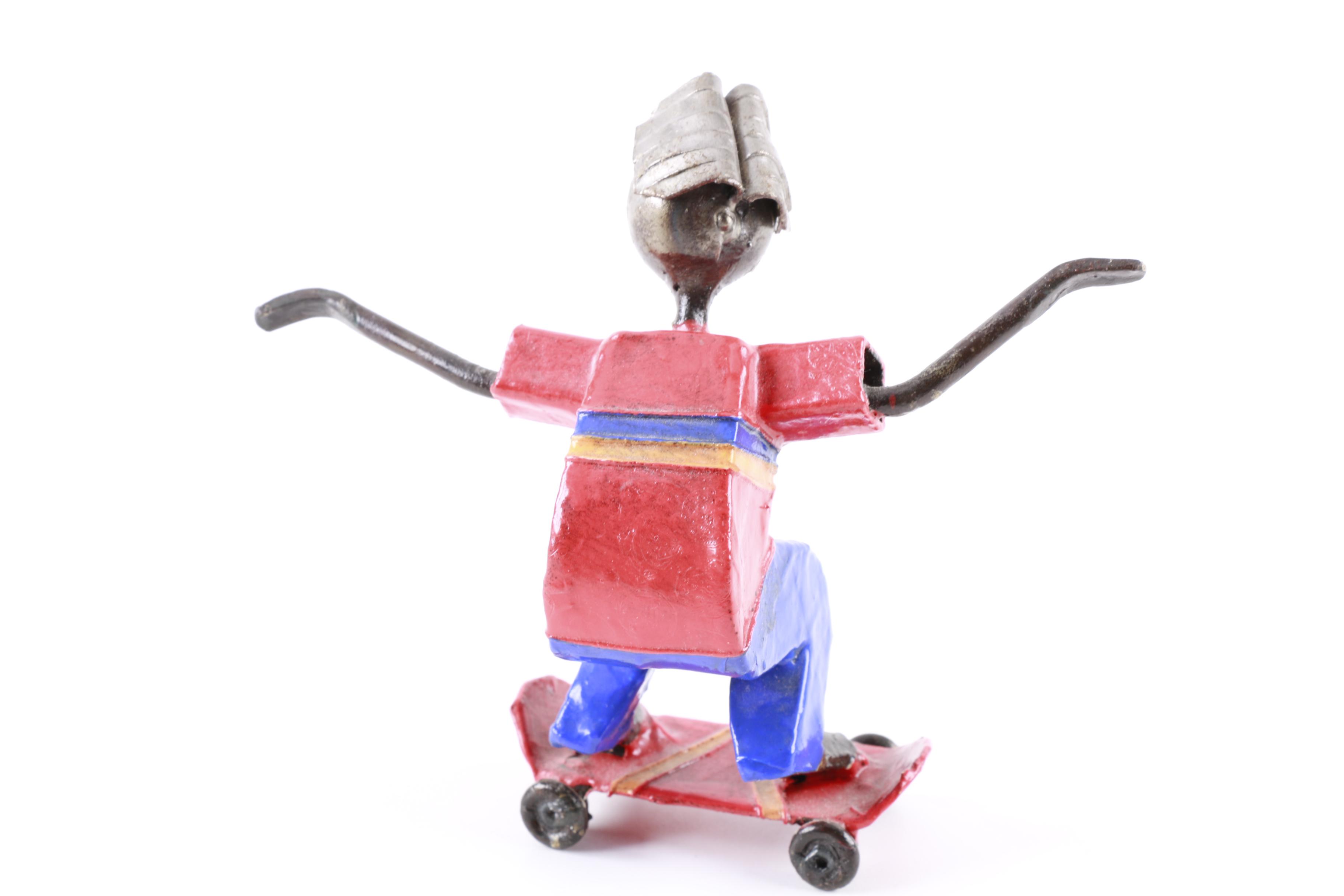 Metal Skateboarder Figurine