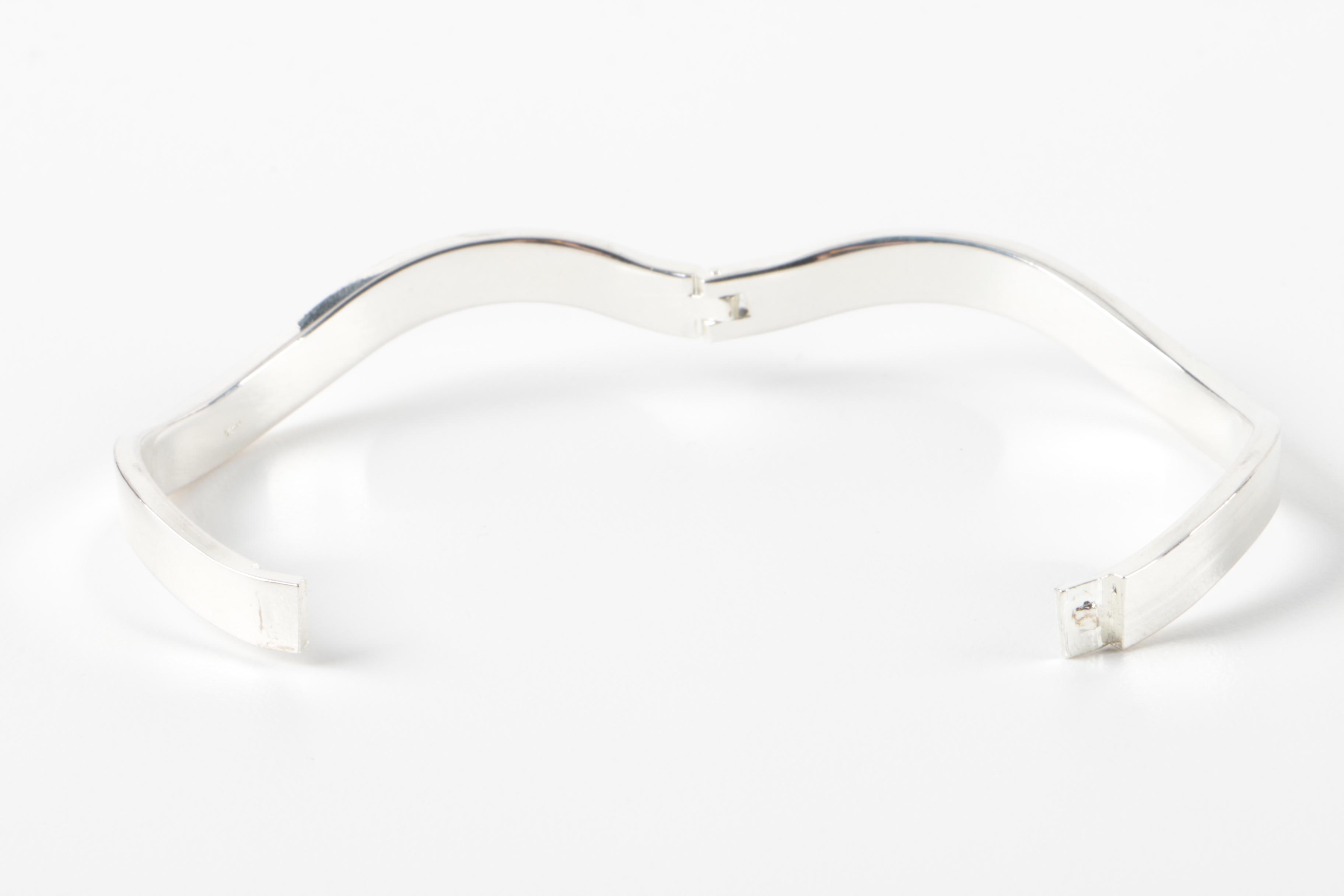 Grouping of Sterling Silver Bangles and Hinged Cuff Bracelet