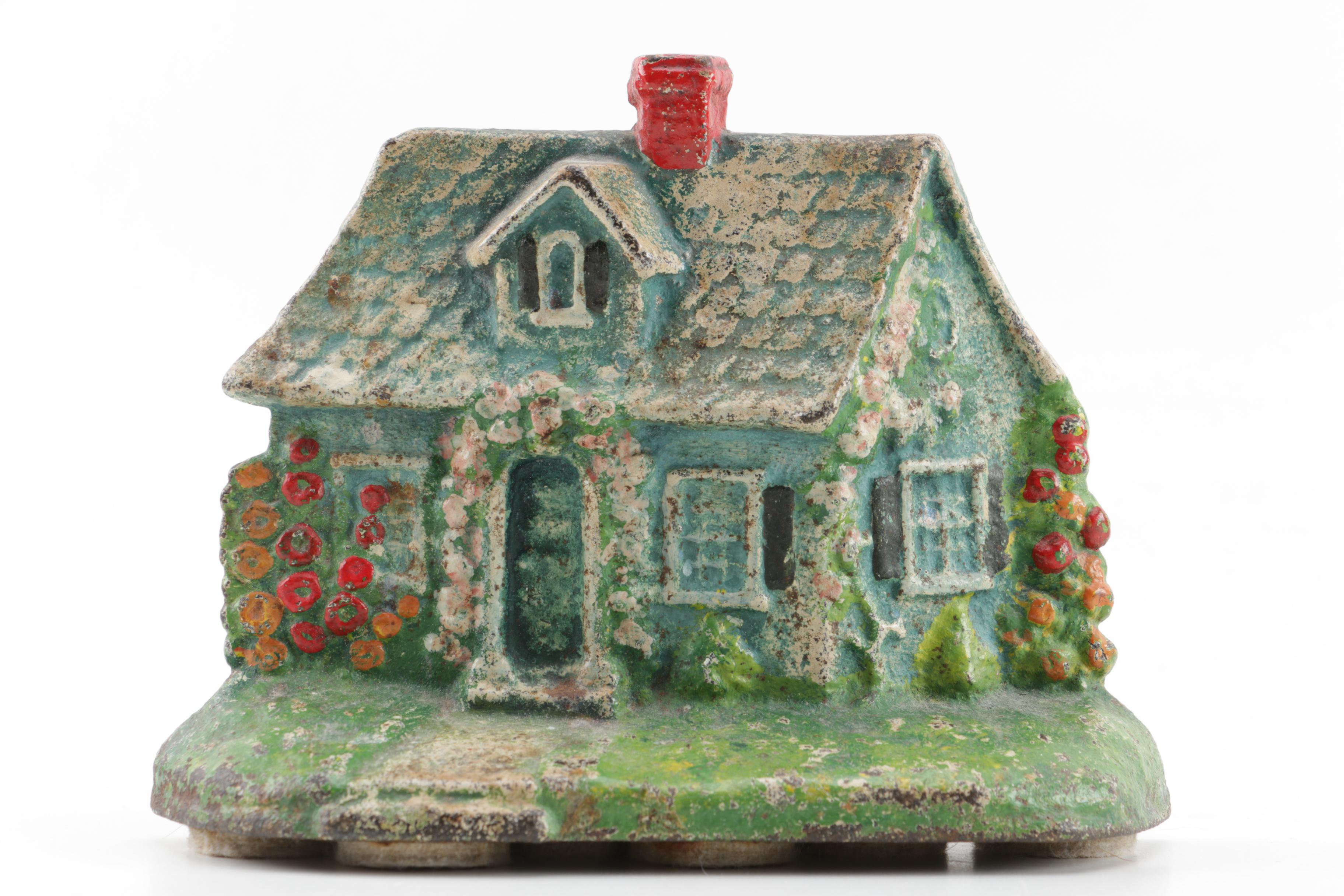 Vintage Cast Iron Cottage Shaped Doorstops