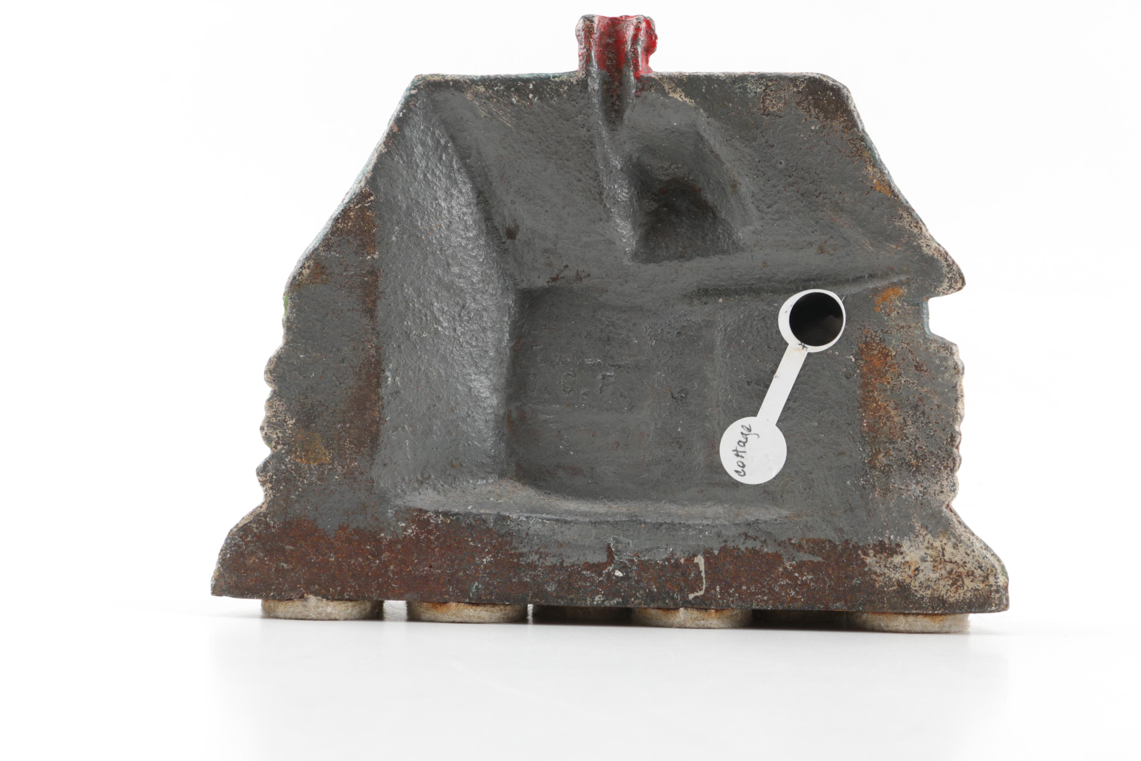 Vintage Cast Iron Cottage Shaped Doorstops