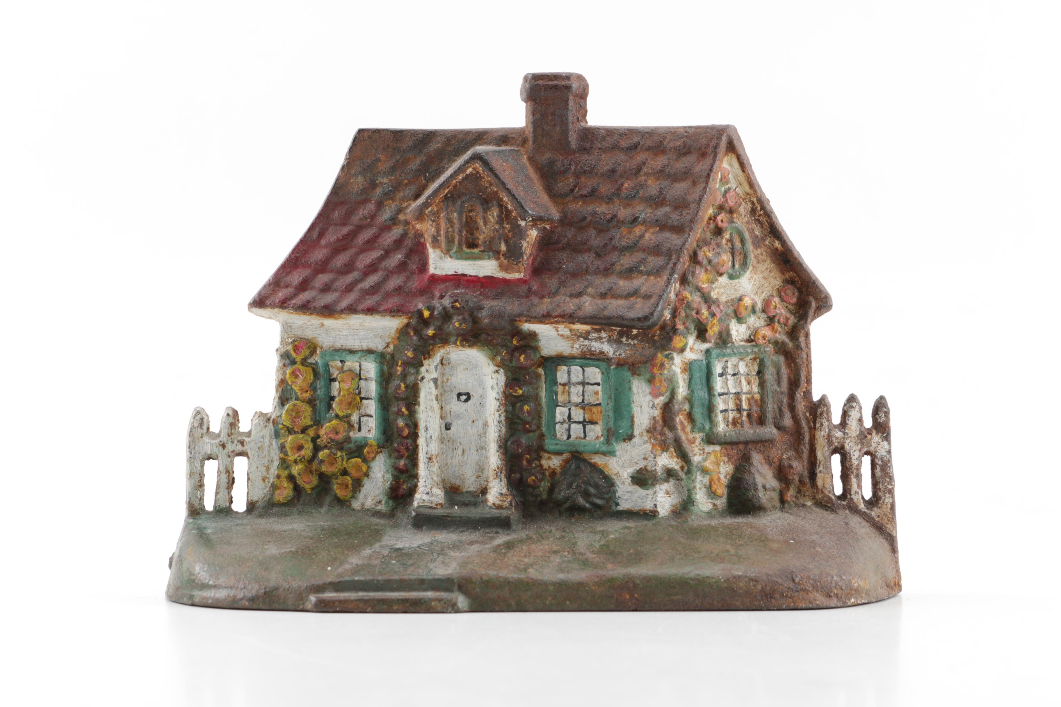 Vintage Cast Iron Cottage Shaped Doorstops