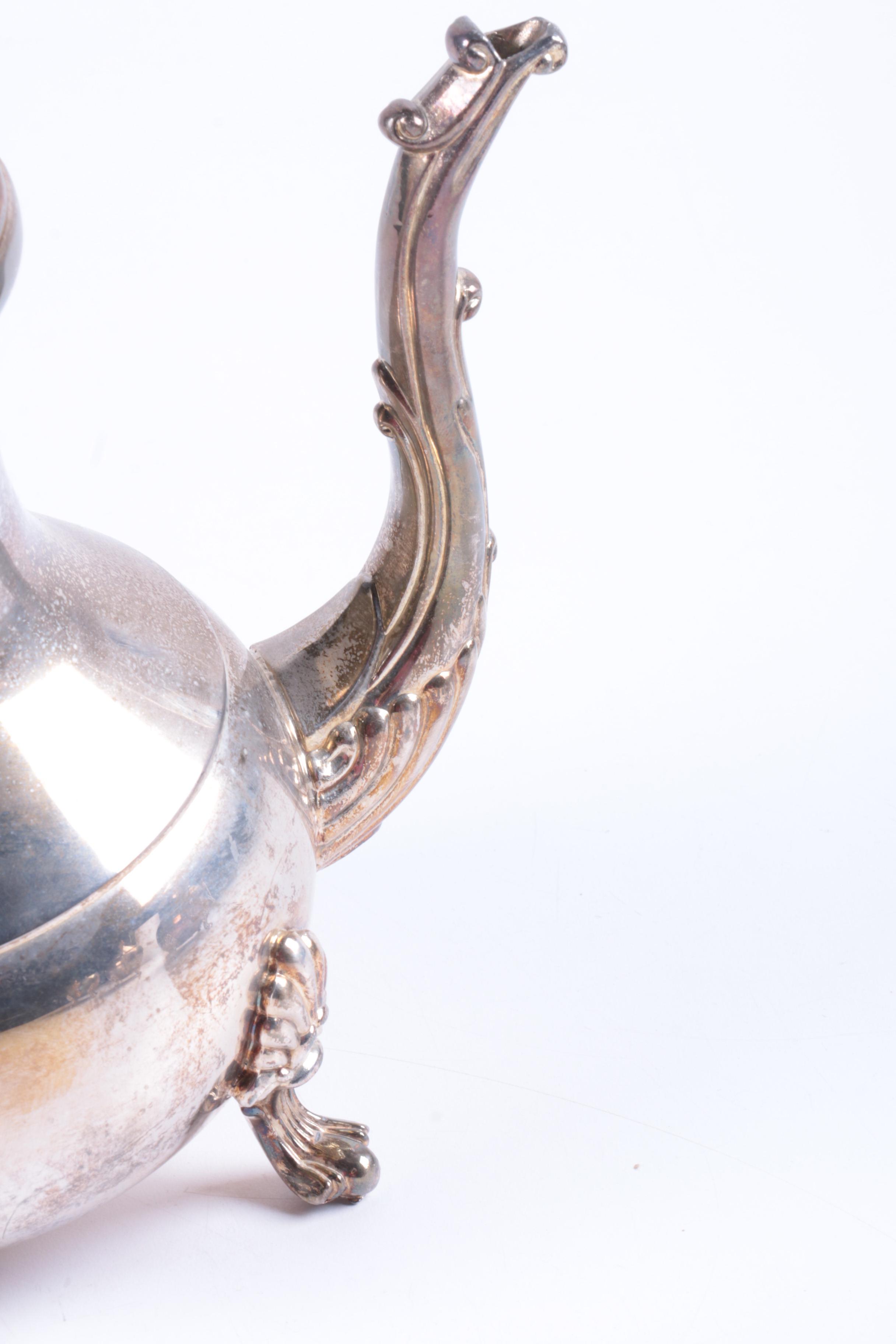 Indonesian Double Scroll Handled Silver Plate Tea and Coffee Service