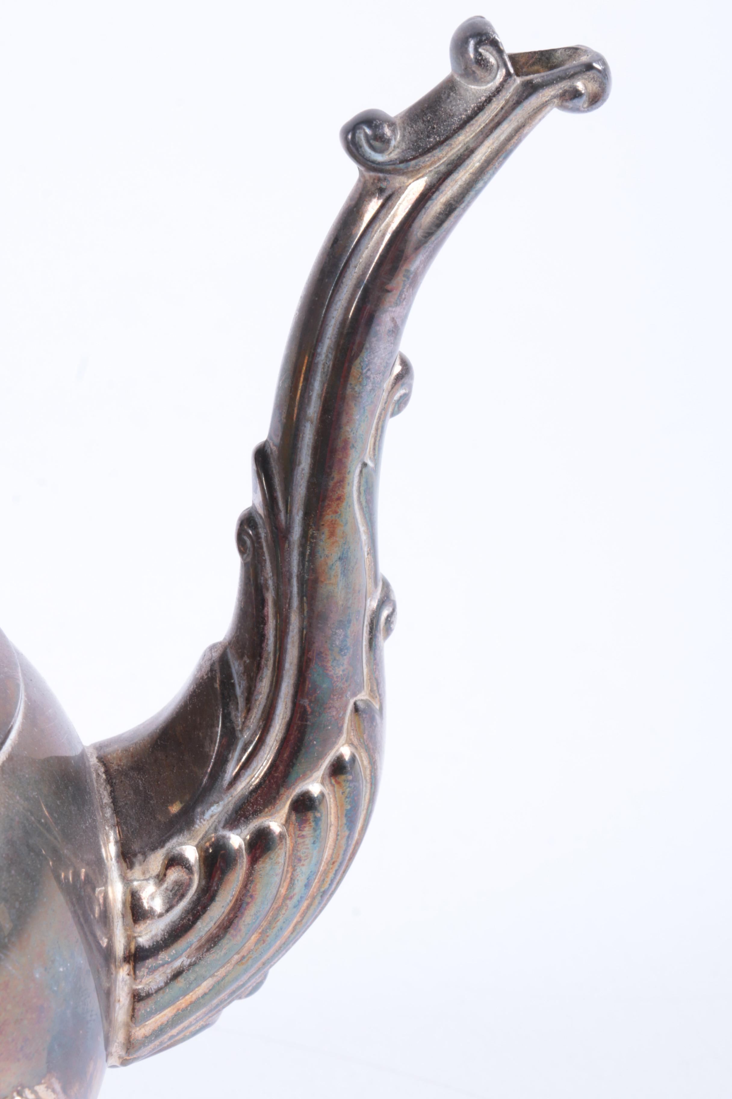 Indonesian Double Scroll Handled Silver Plate Tea and Coffee Service