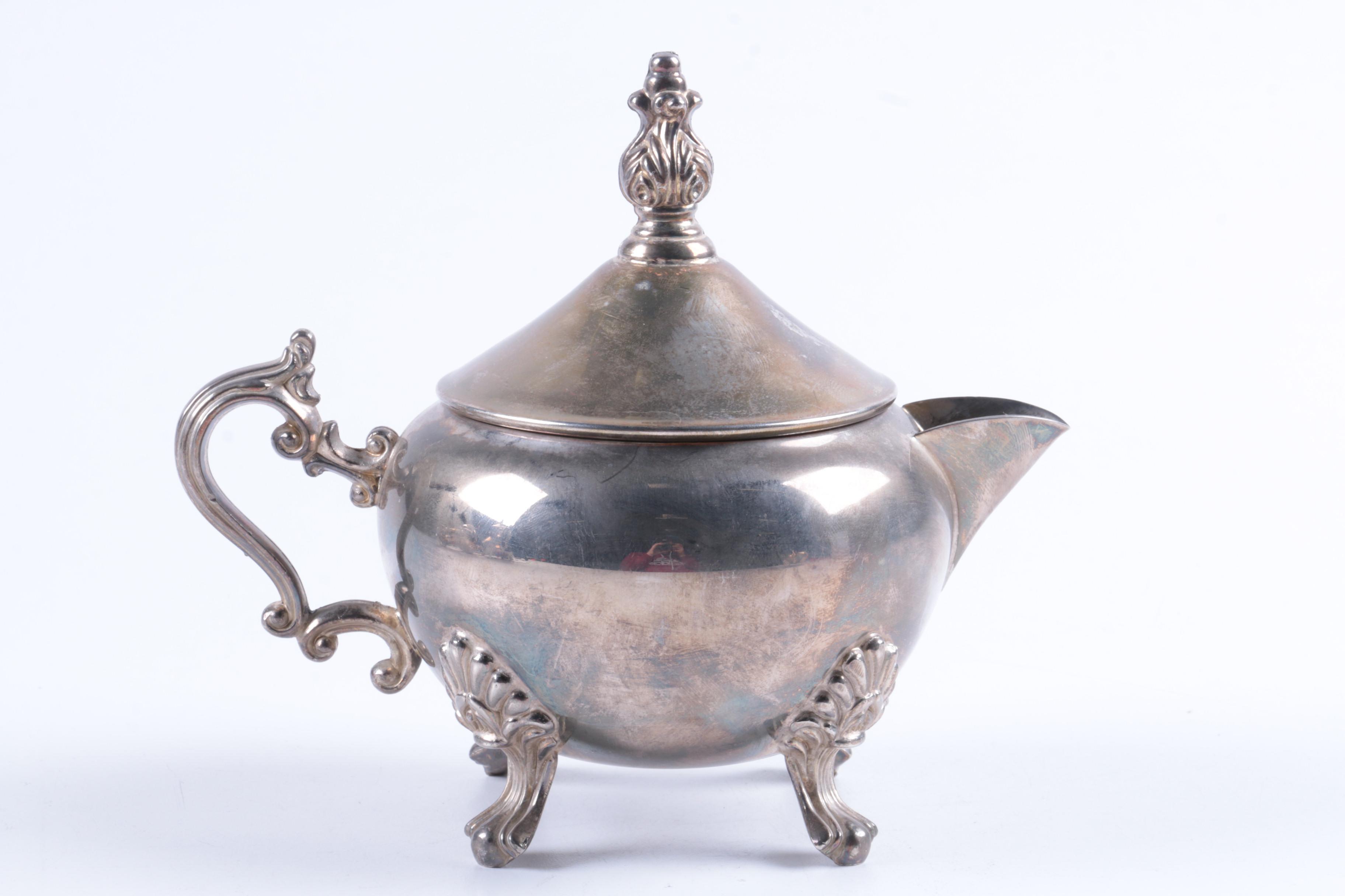Indonesian Double Scroll Handled Silver Plate Tea and Coffee Service