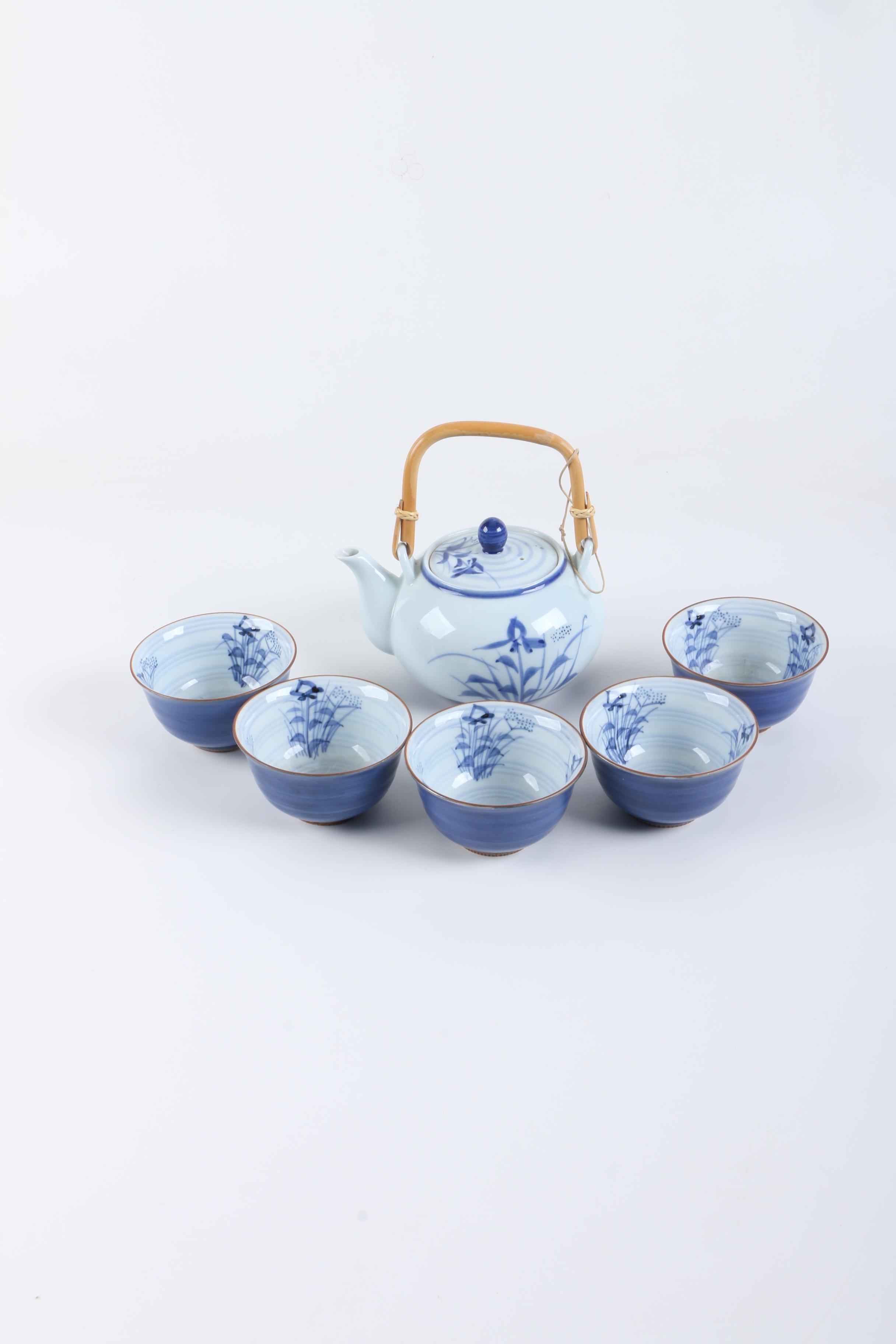 East Asian Porcelain Teapot and Tea Bowls