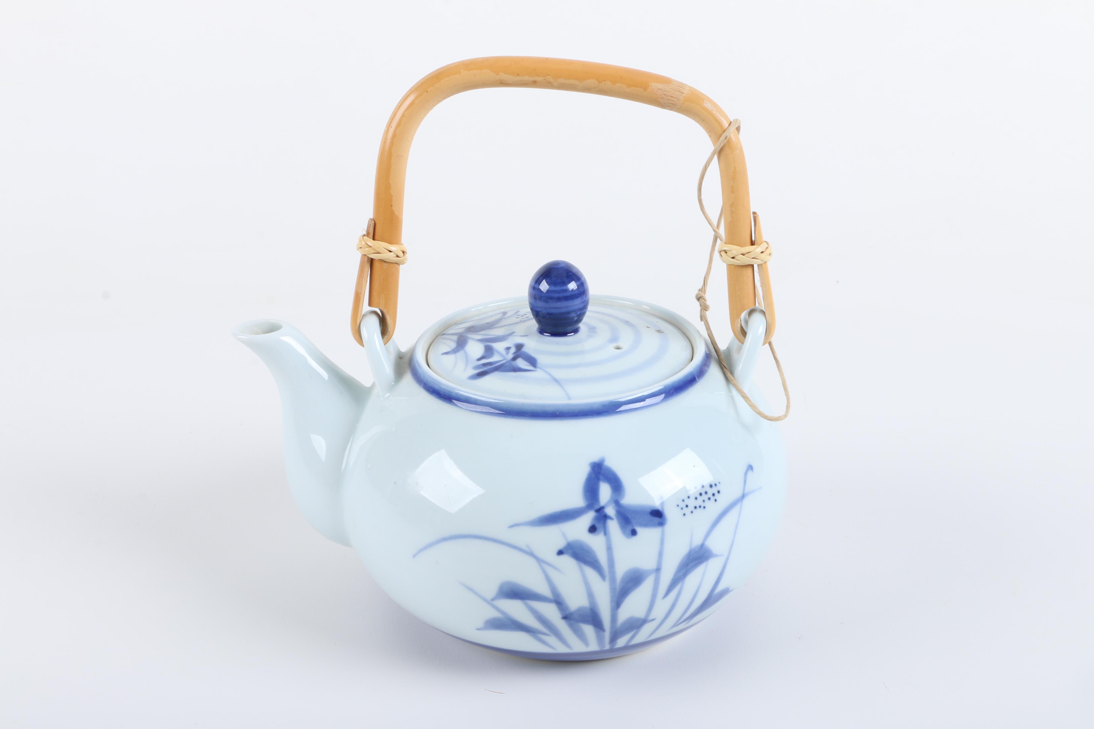 East Asian Porcelain Teapot and Tea Bowls