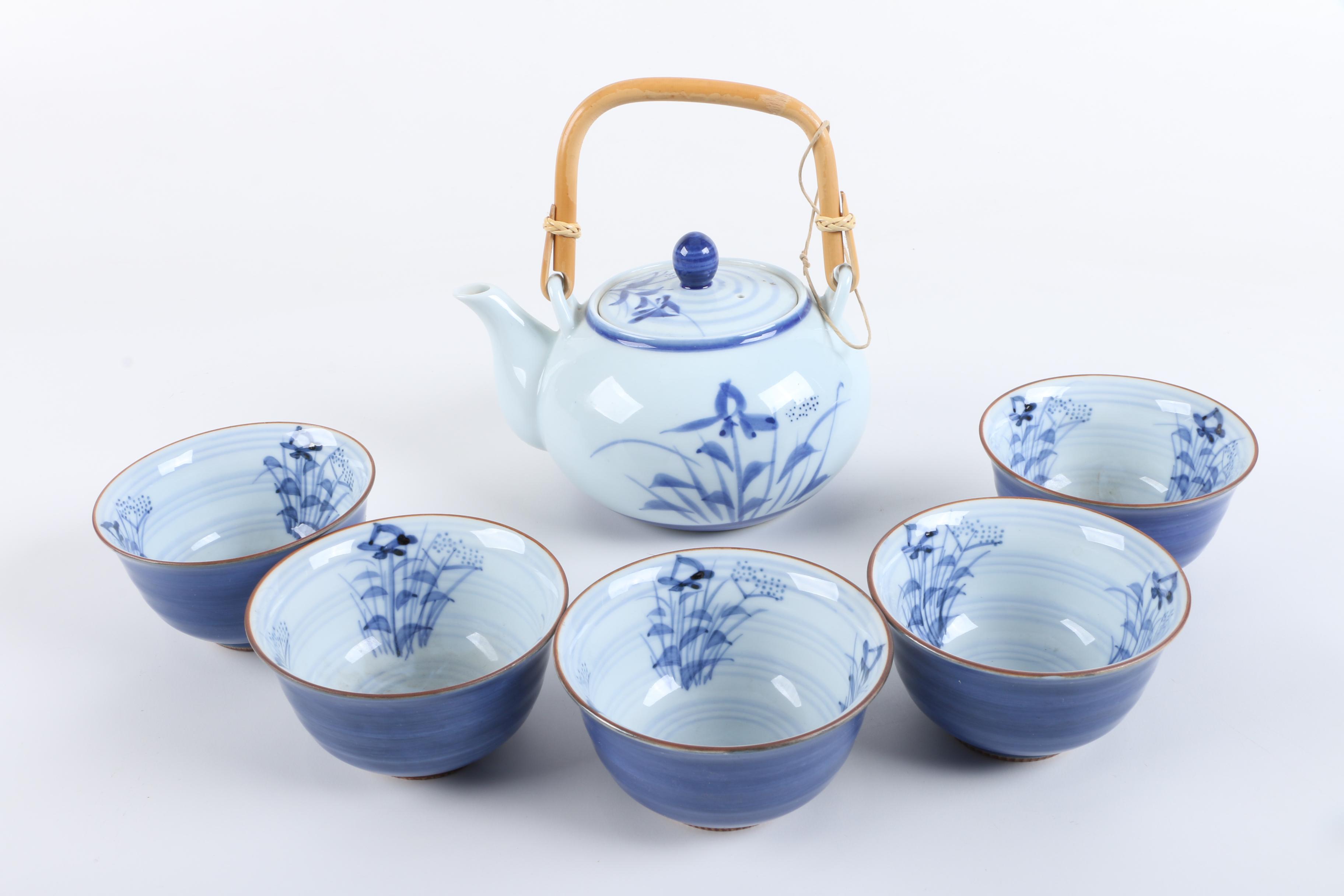 East Asian Porcelain Teapot and Tea Bowls