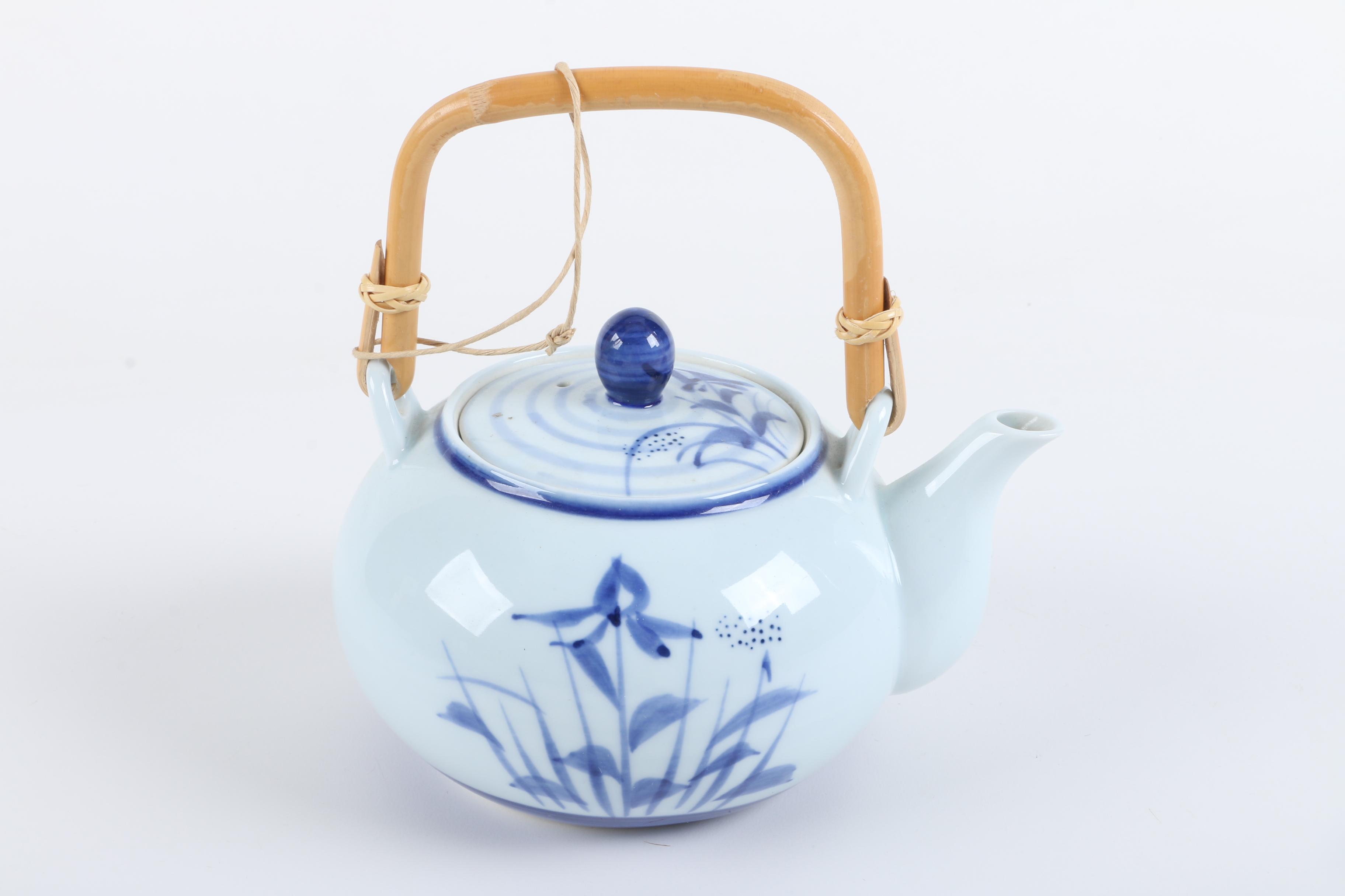 East Asian Porcelain Teapot and Tea Bowls