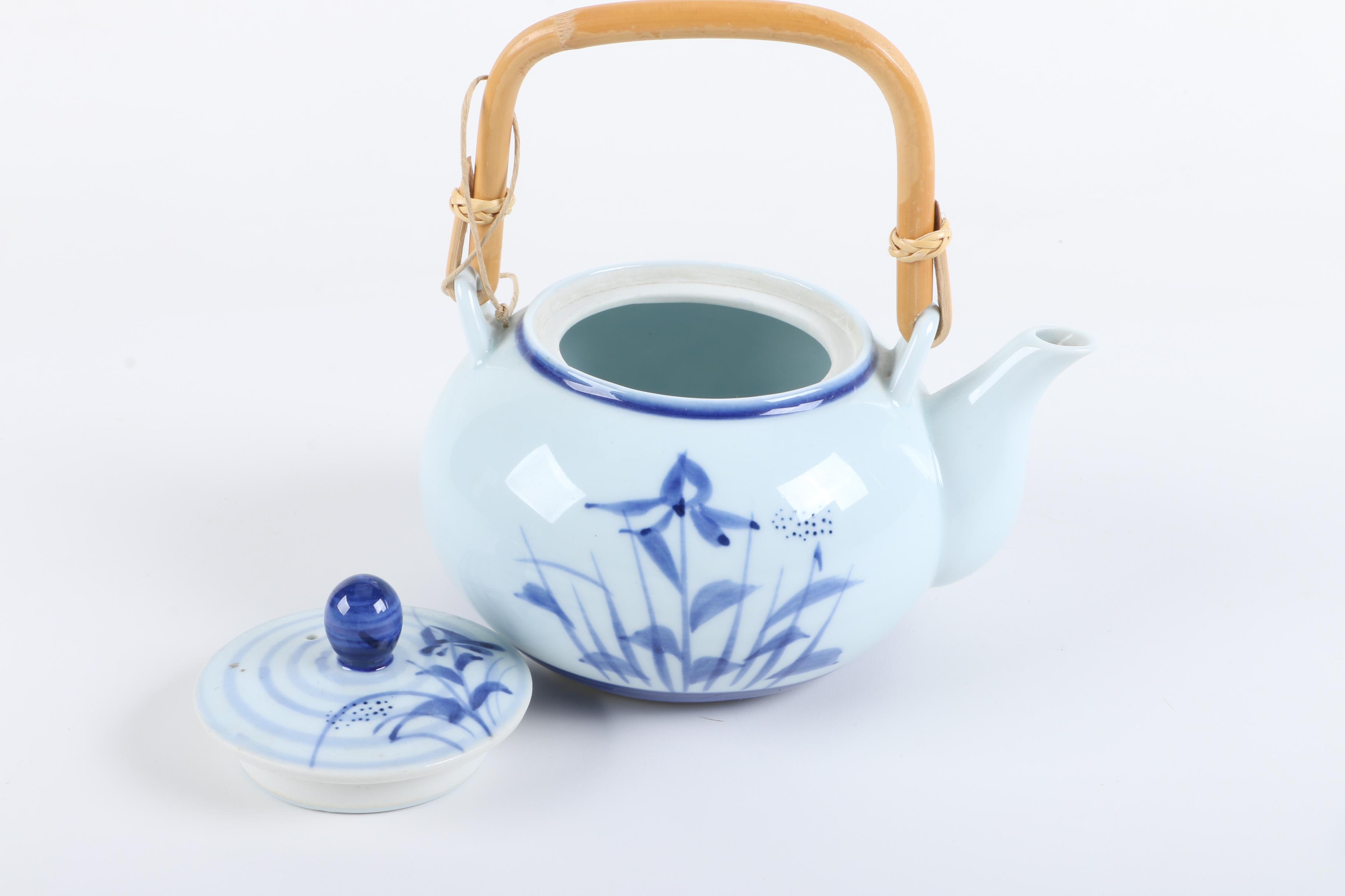 East Asian Porcelain Teapot and Tea Bowls