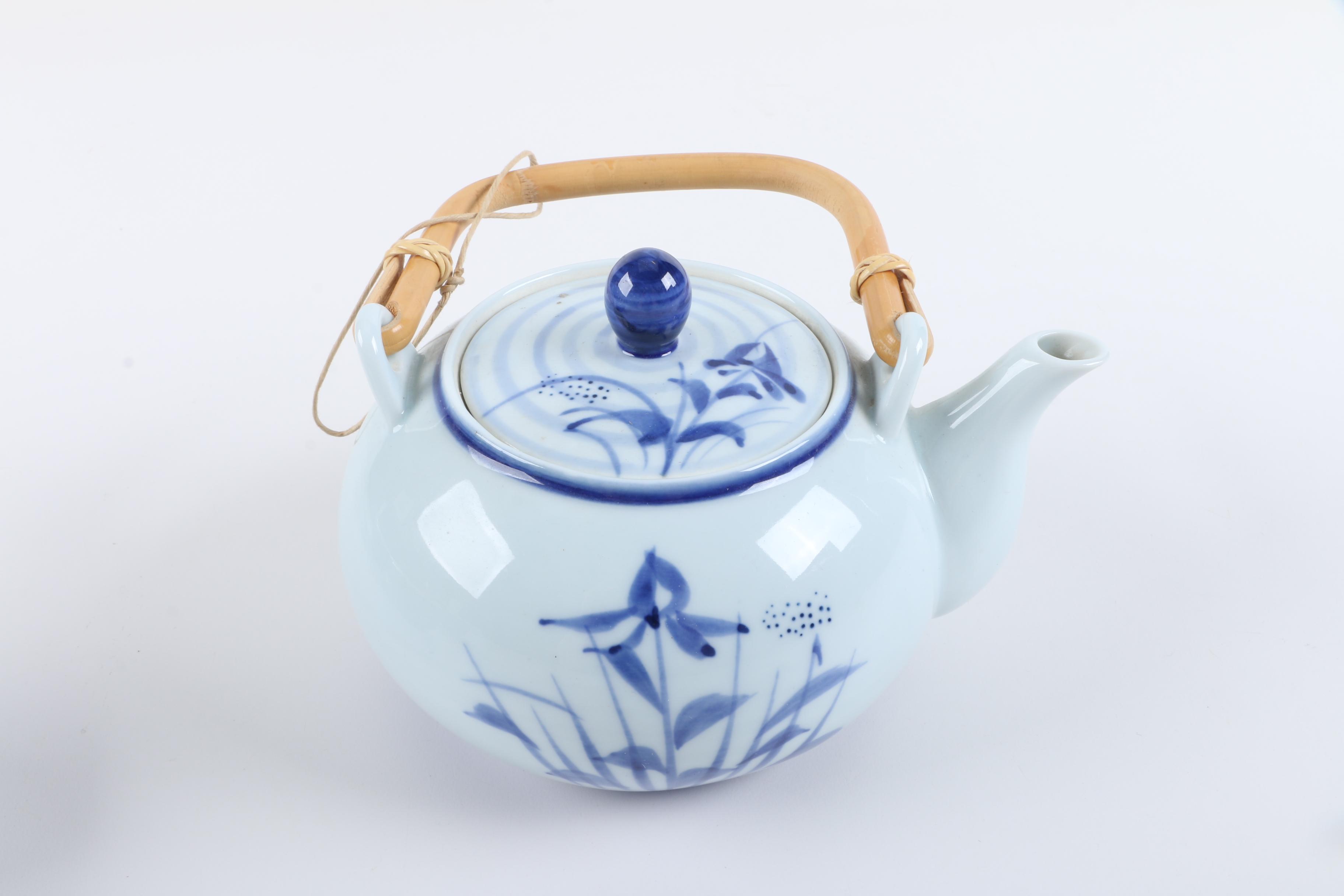 East Asian Porcelain Teapot and Tea Bowls