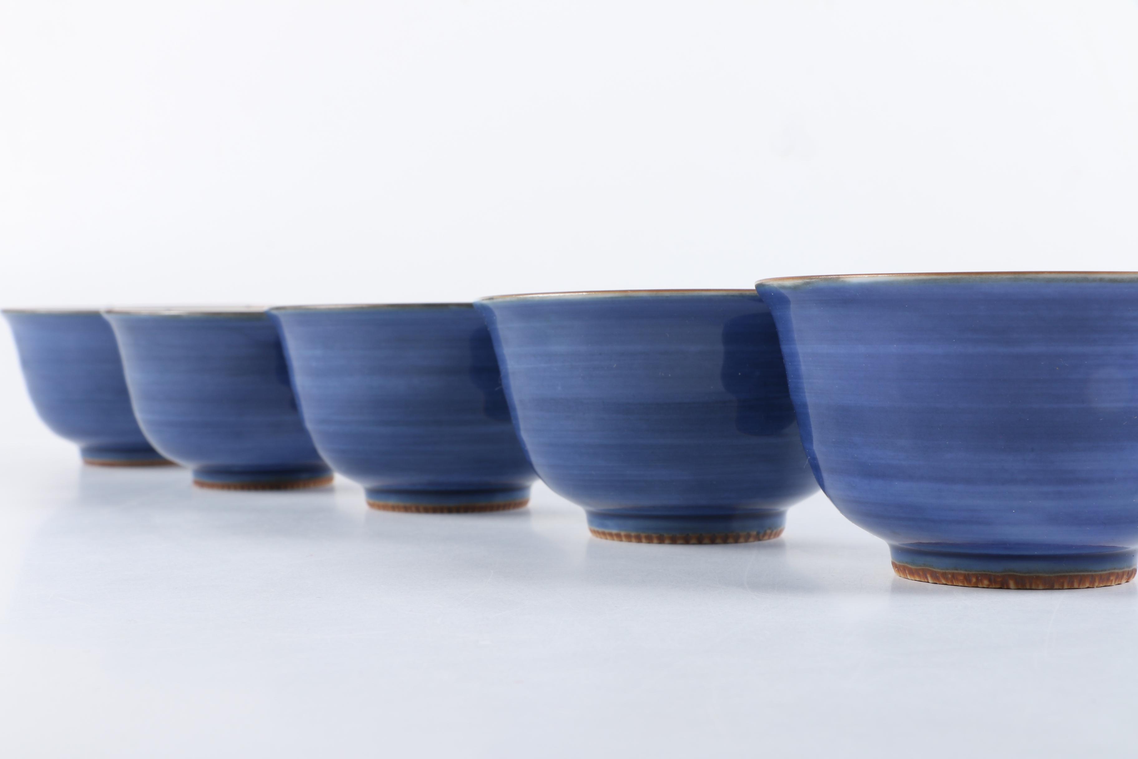 East Asian Porcelain Teapot and Tea Bowls