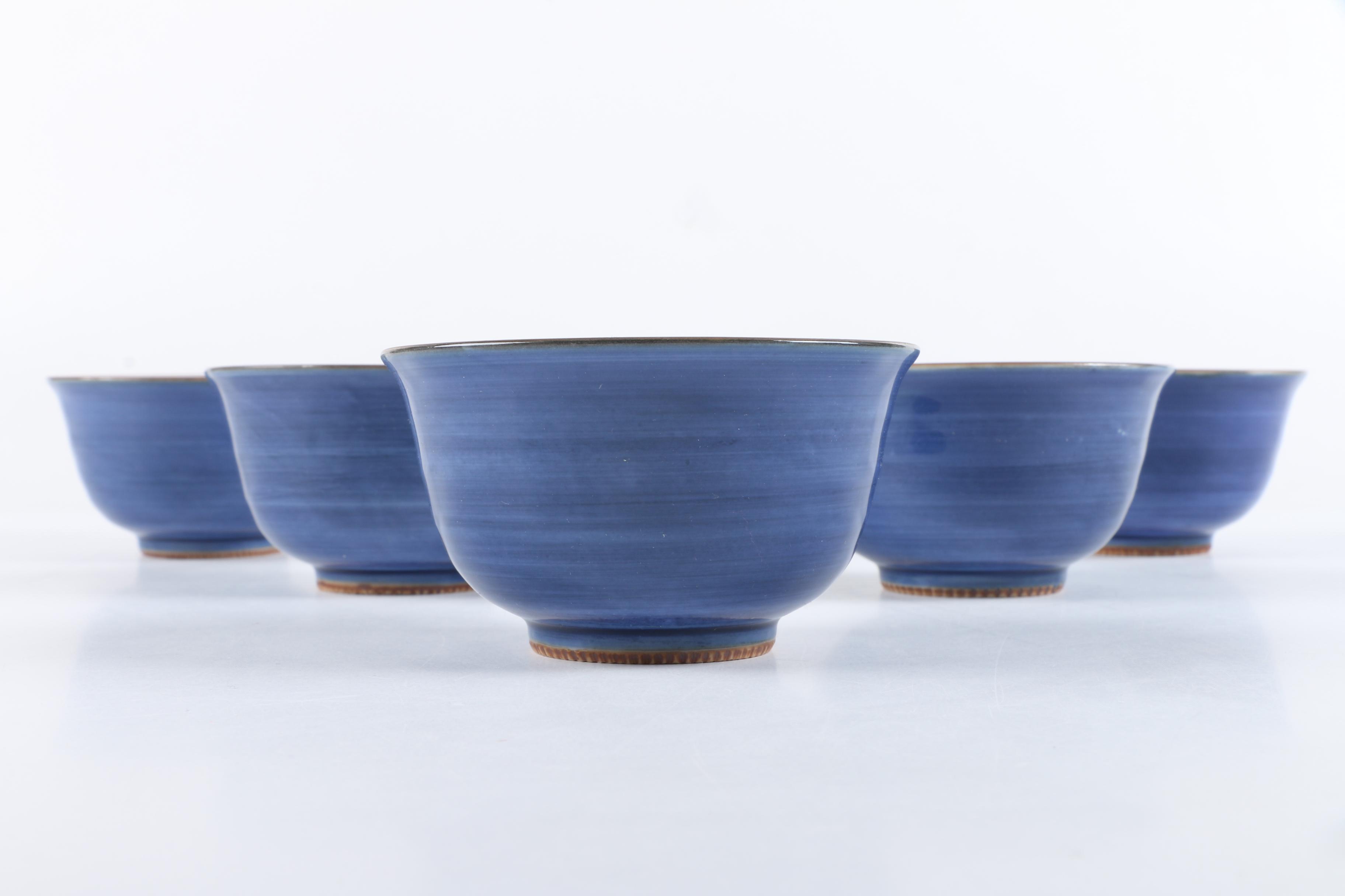 East Asian Porcelain Teapot and Tea Bowls