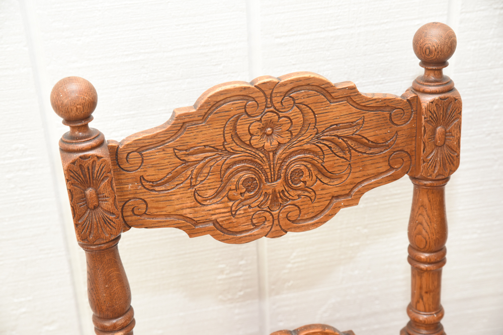 Pair of Carved Oak and Leather Upholstered Side Chairs
