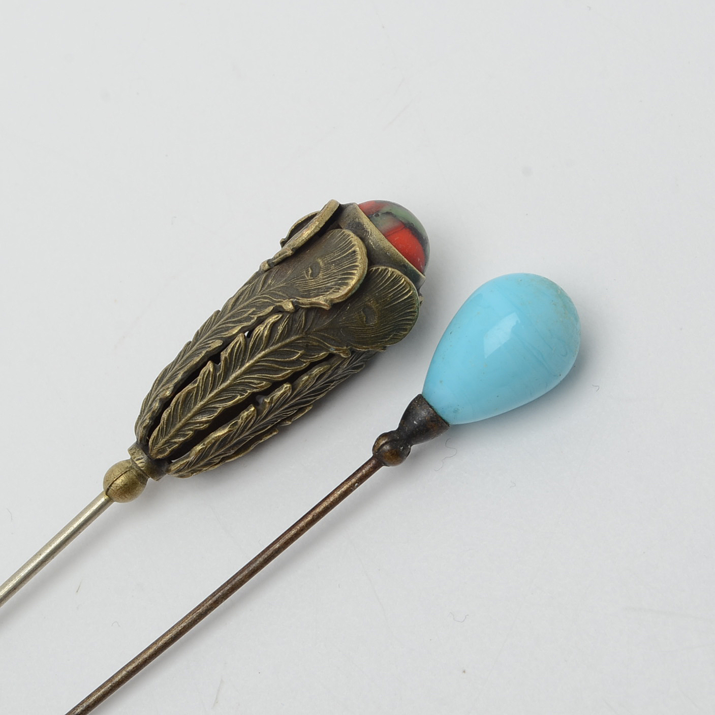 Assortment of Victorian Hat Pins Including Sterling Silver and Carved Coral