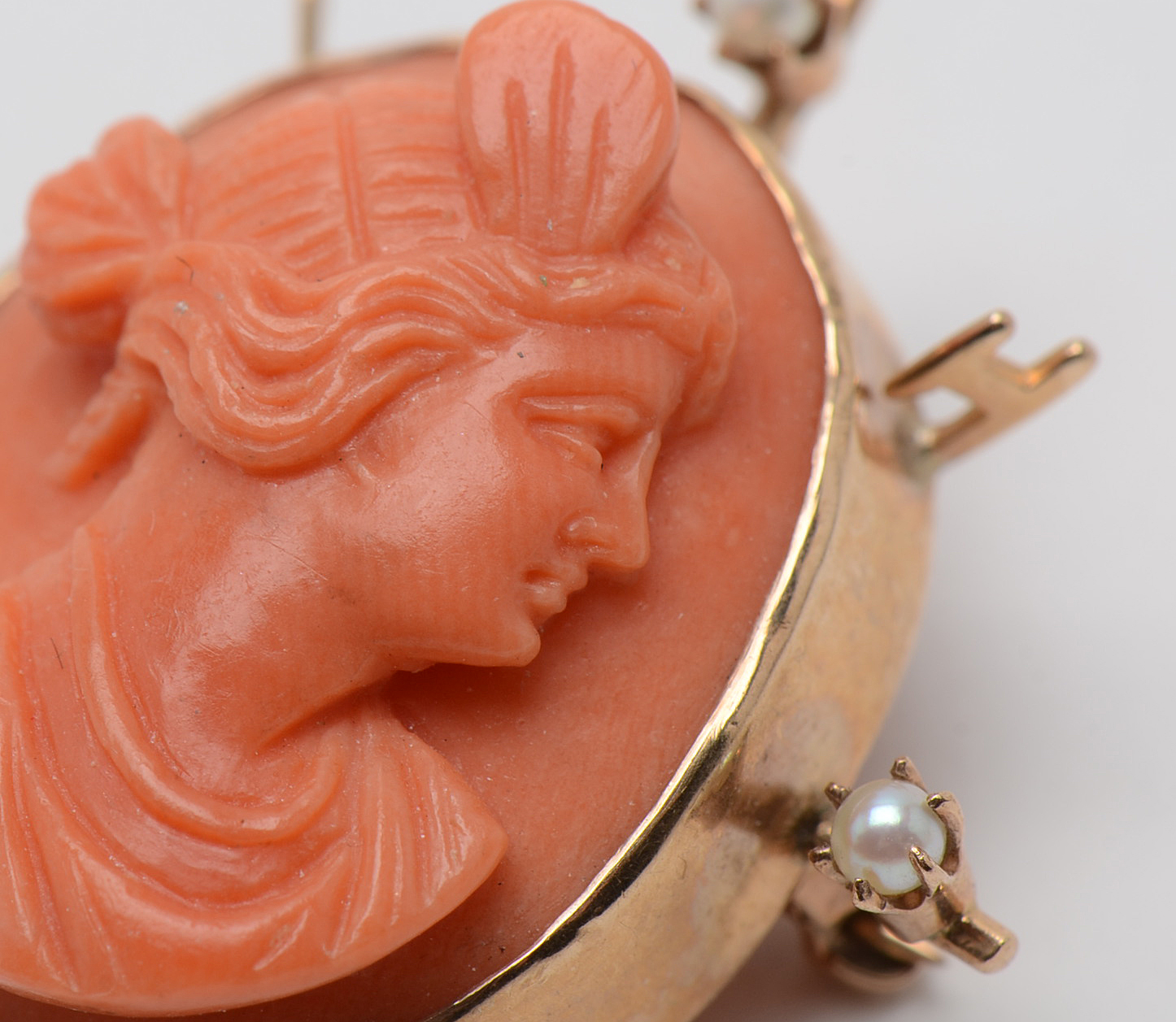Early 20th Century 10K Yellow Gold Carved Coral Cameo Seed Pearl Pendant Brooch