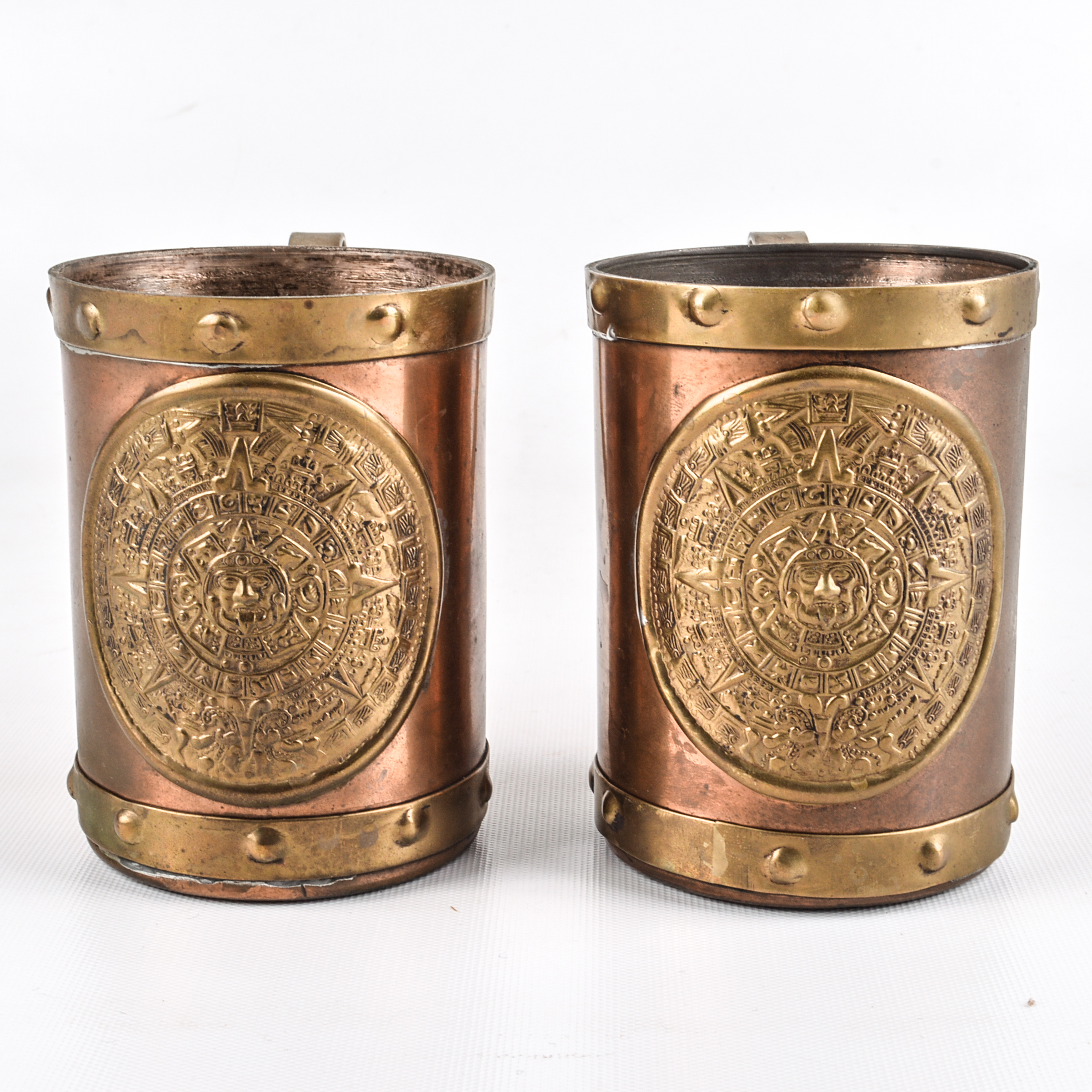 Pair of Vintage Copper and Brass Aztec Motif Mugs