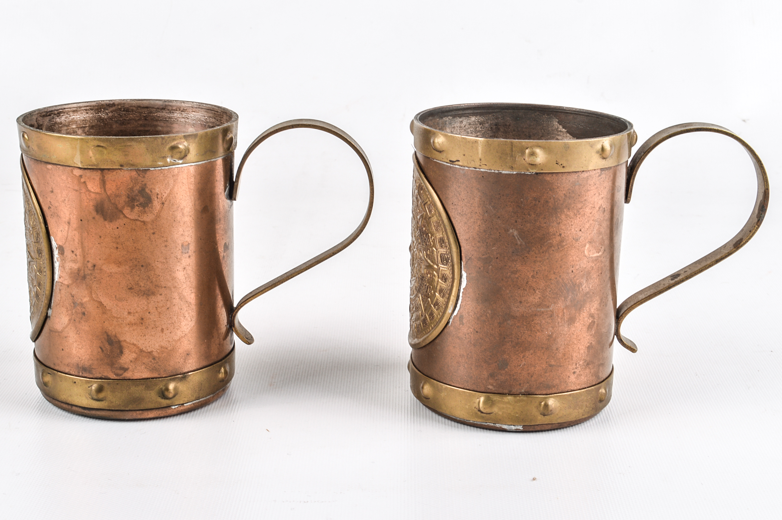 Pair of Vintage Copper and Brass Aztec Motif Mugs