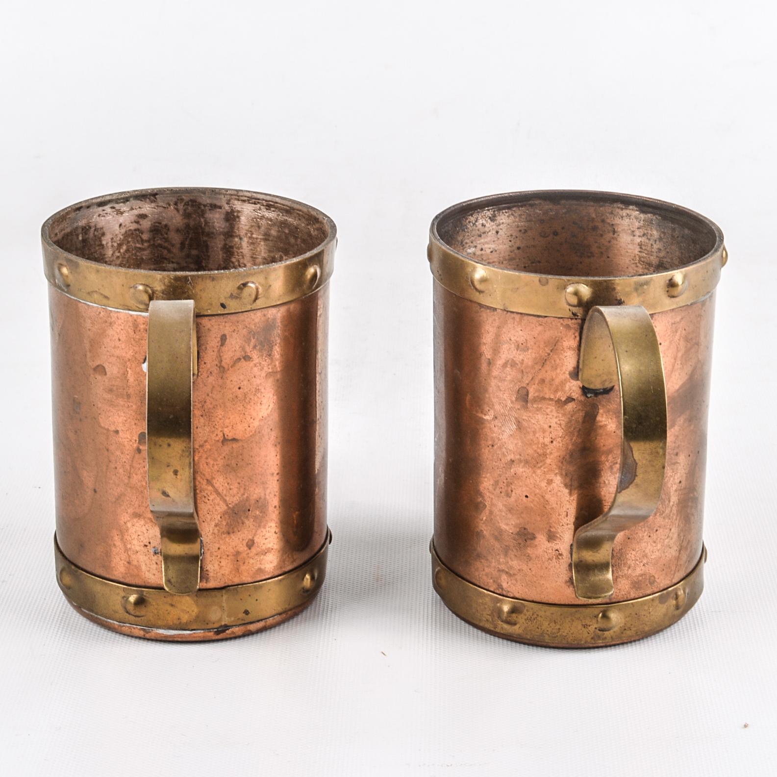 Pair of Vintage Copper and Brass Aztec Motif Mugs