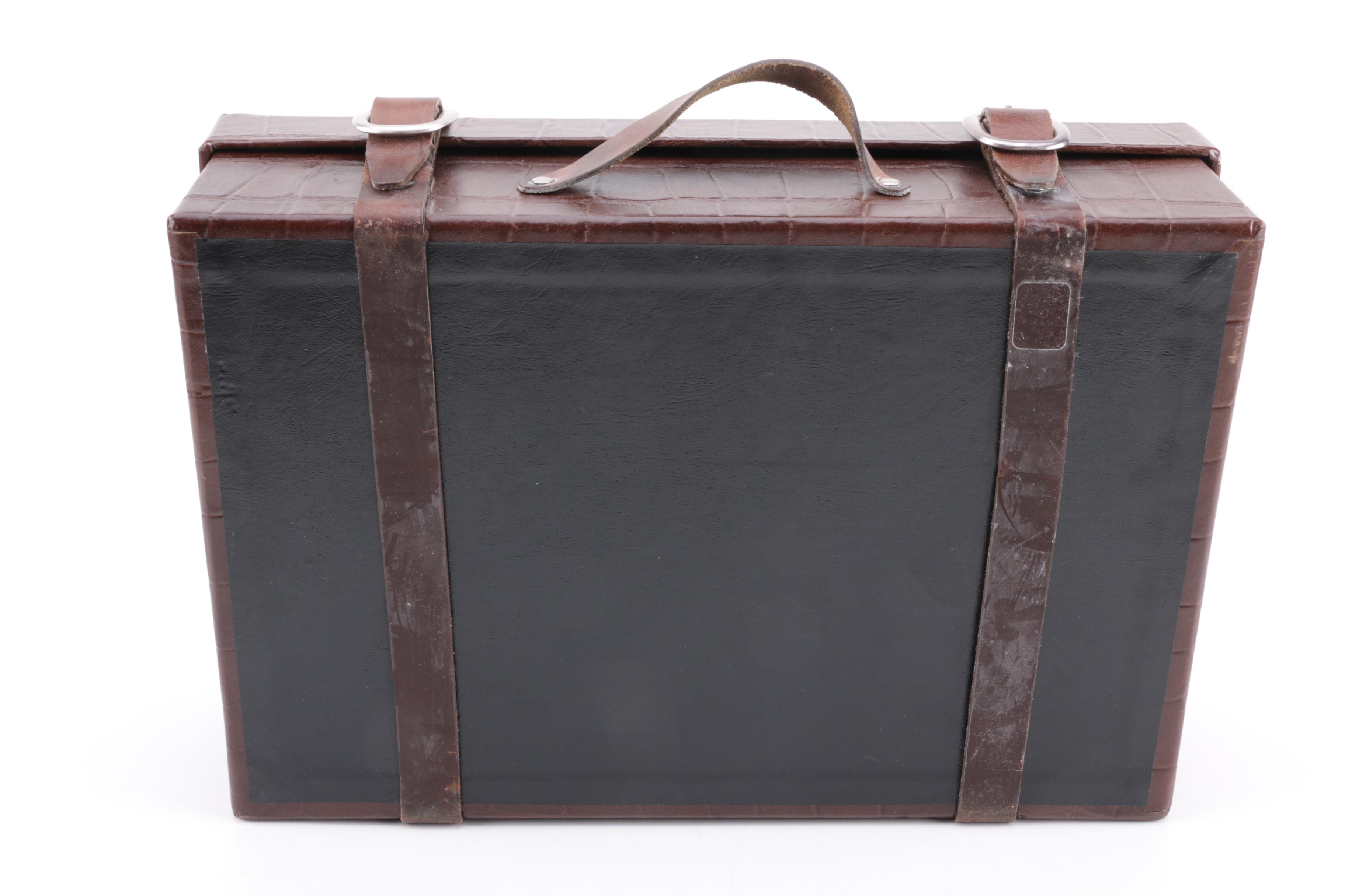 Two Faux Leather Storage Boxes