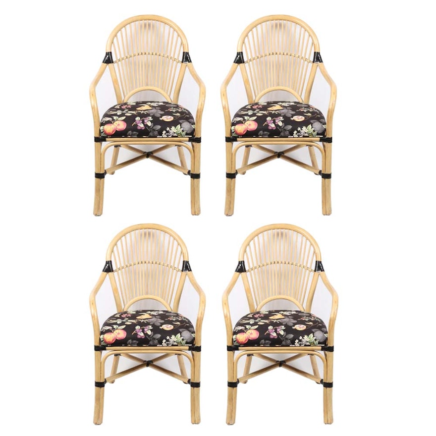 Four Rattan Style Arm Chairs