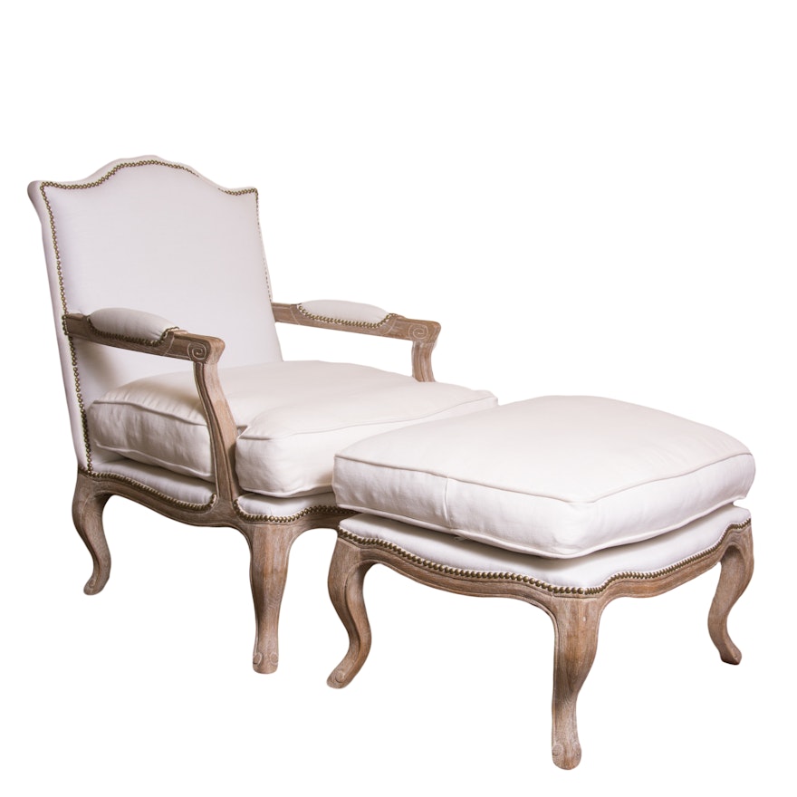 White Upholstered Chair and Ottoman