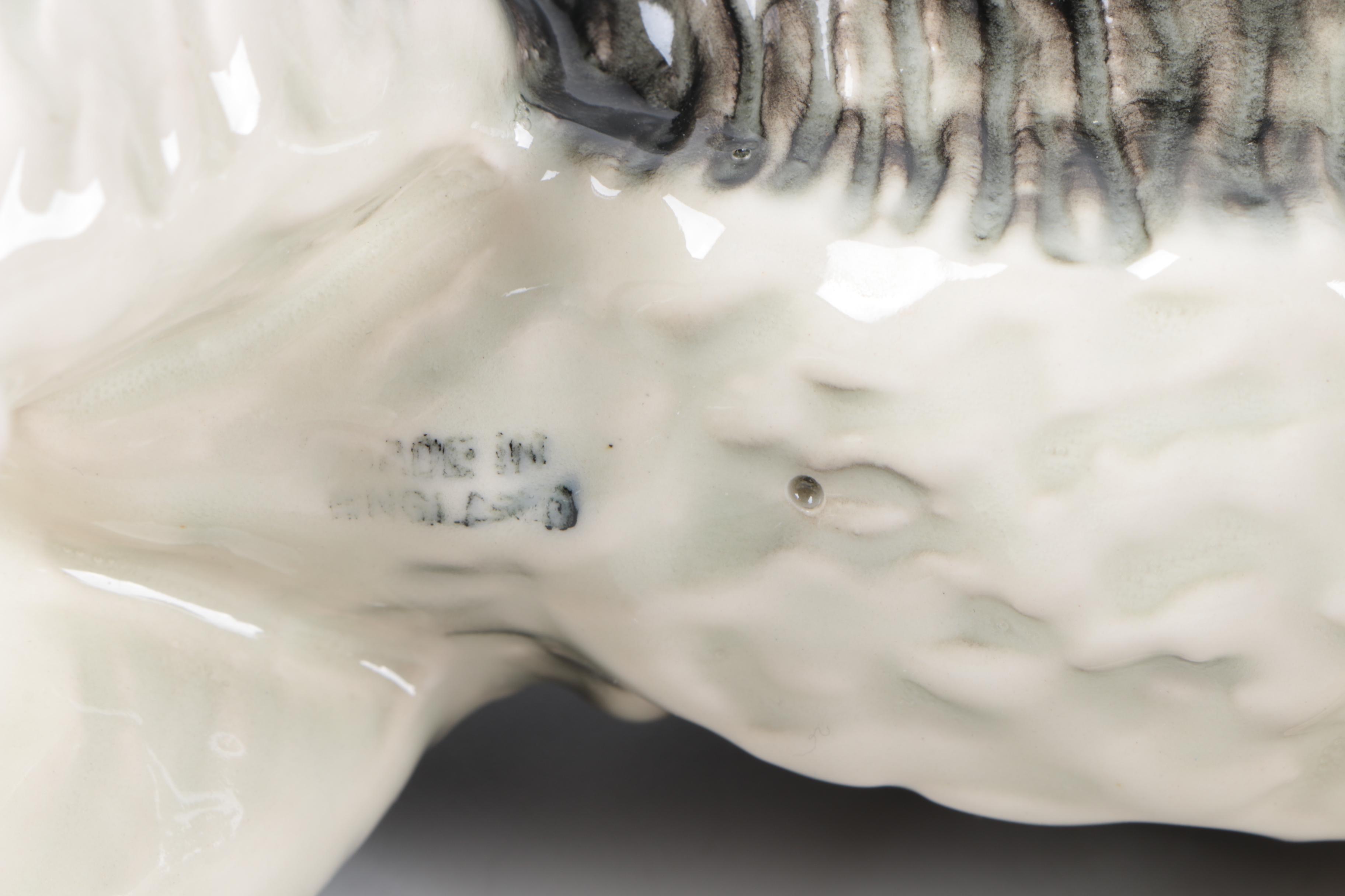 Ceramic and Porcelain Dog Figurines Including Royal Doulton