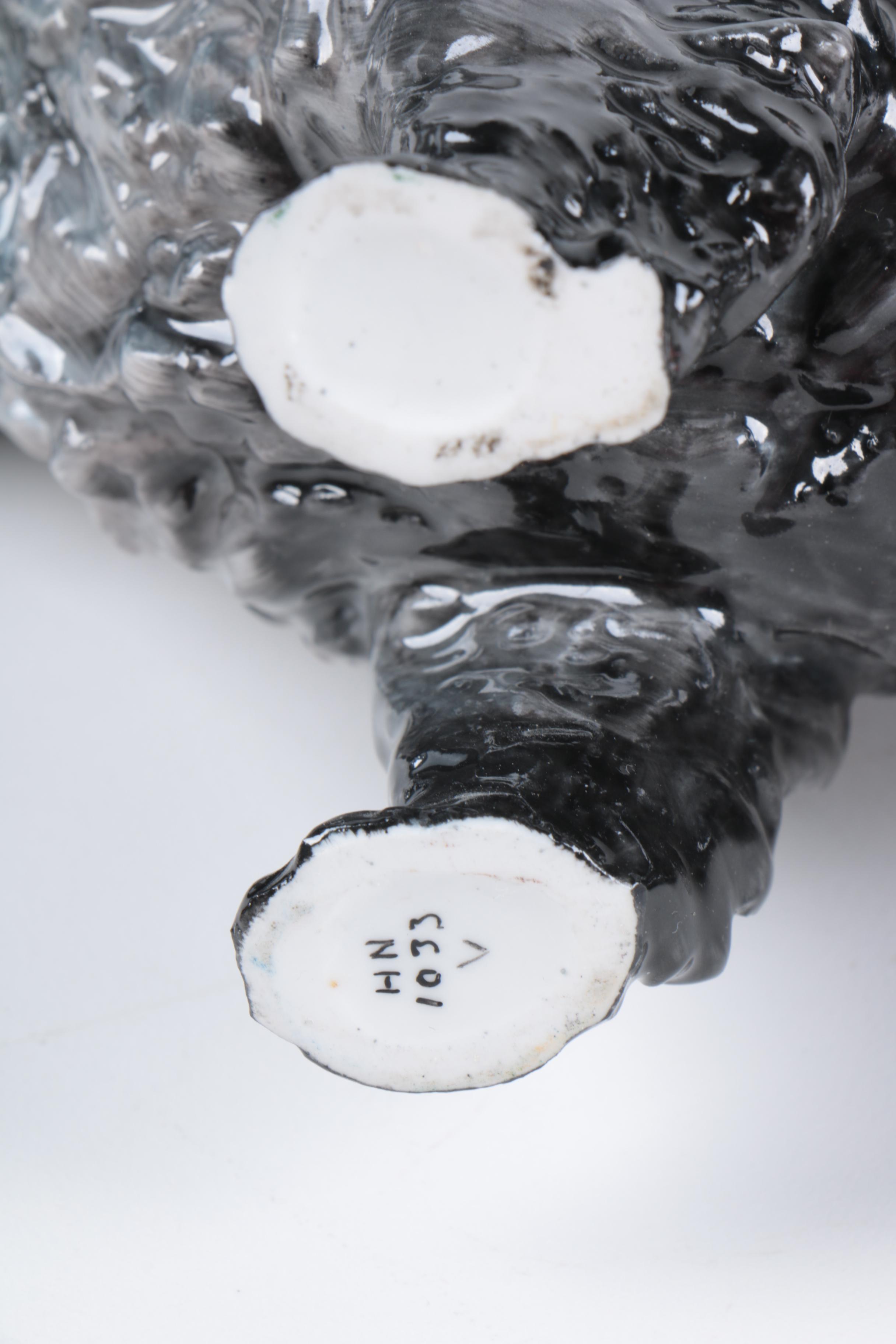 Ceramic and Porcelain Dog Figurines Including Royal Doulton