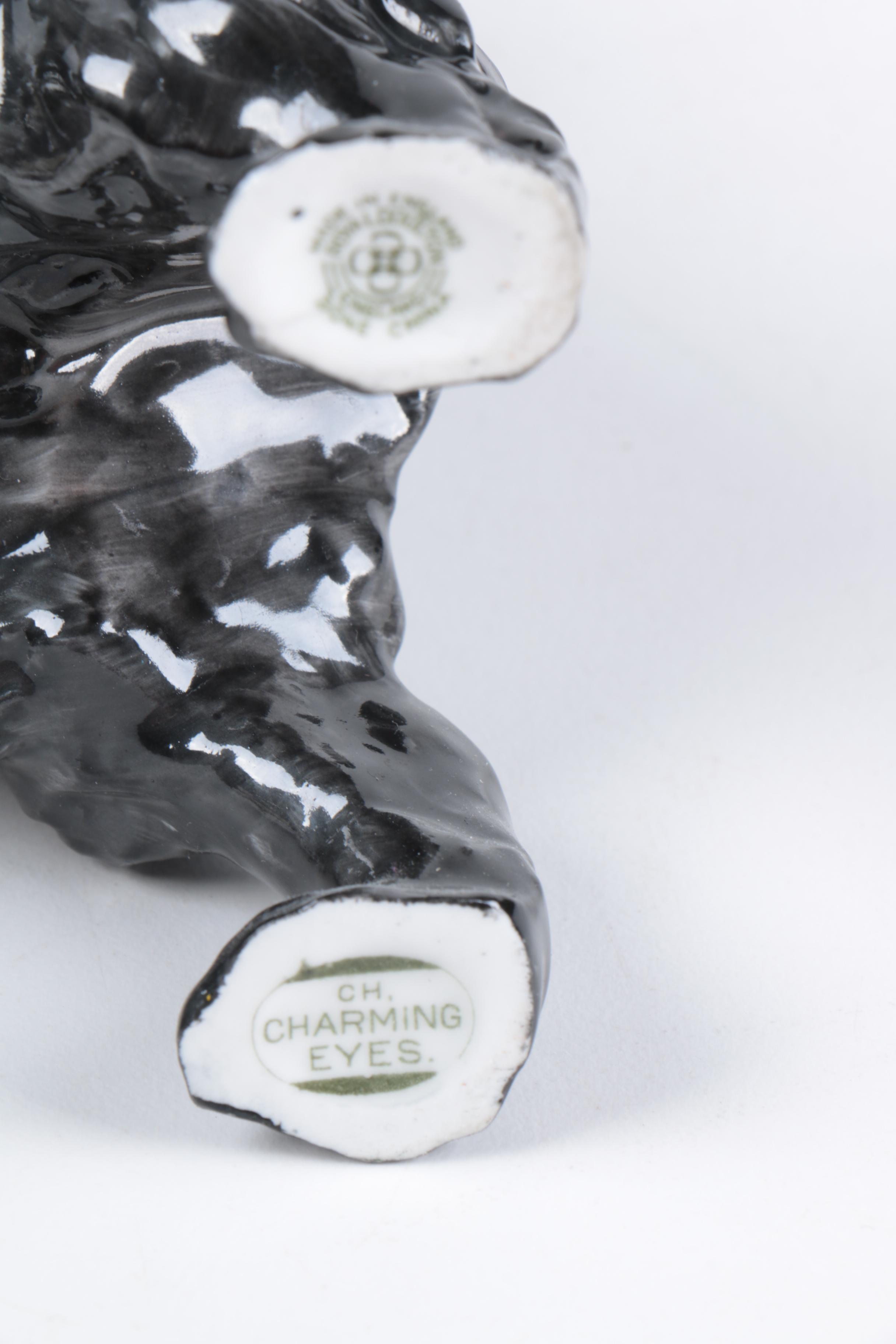 Ceramic and Porcelain Dog Figurines Including Royal Doulton