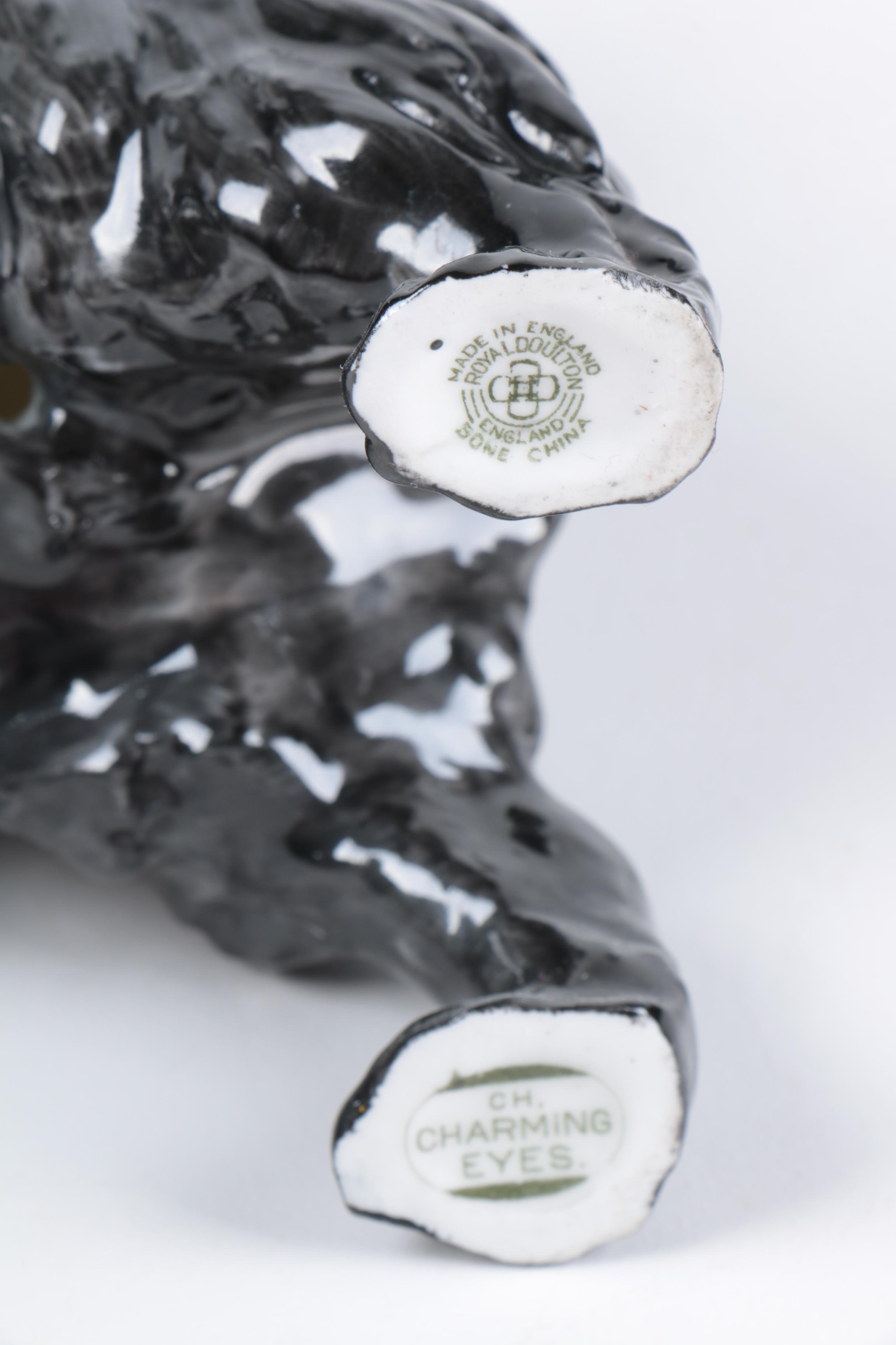 Ceramic and Porcelain Dog Figurines Including Royal Doulton