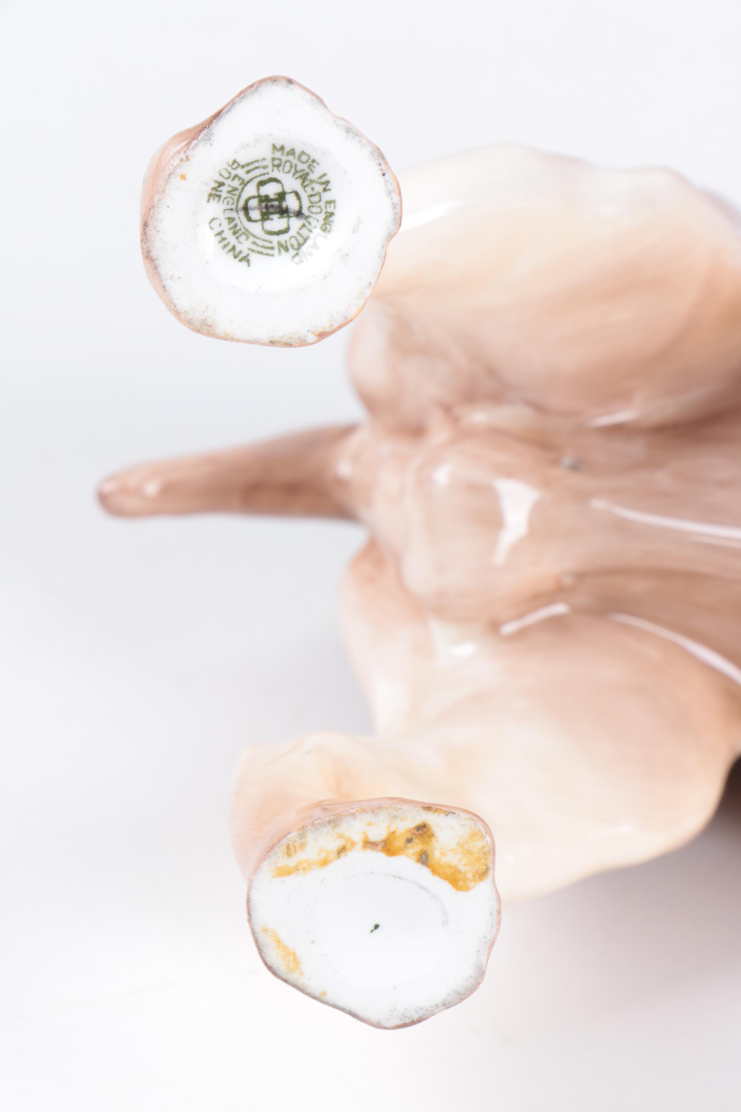 Ceramic and Porcelain Dog Figurines Including Royal Doulton