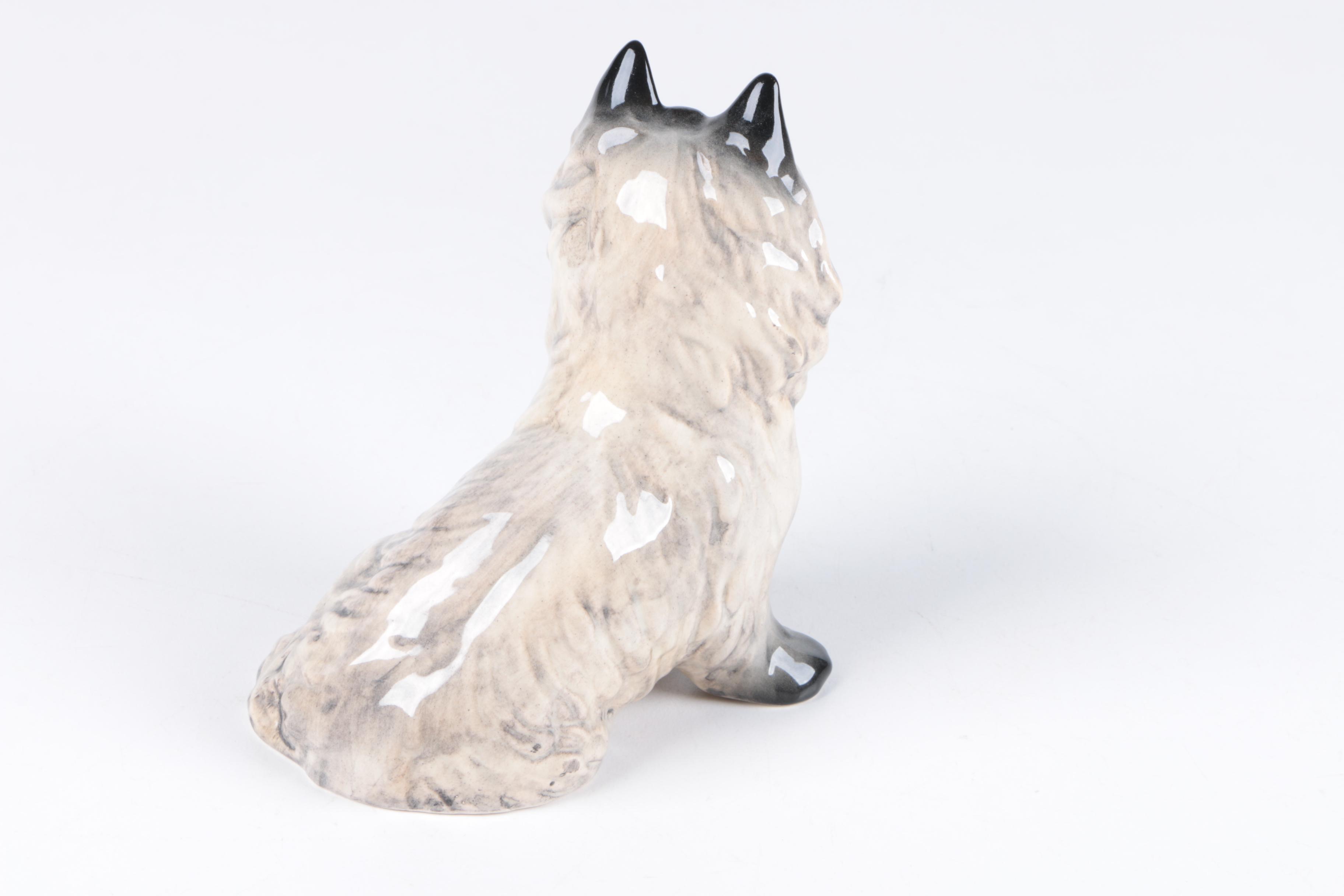 Ceramic and Porcelain Dog Figurines Including Royal Doulton