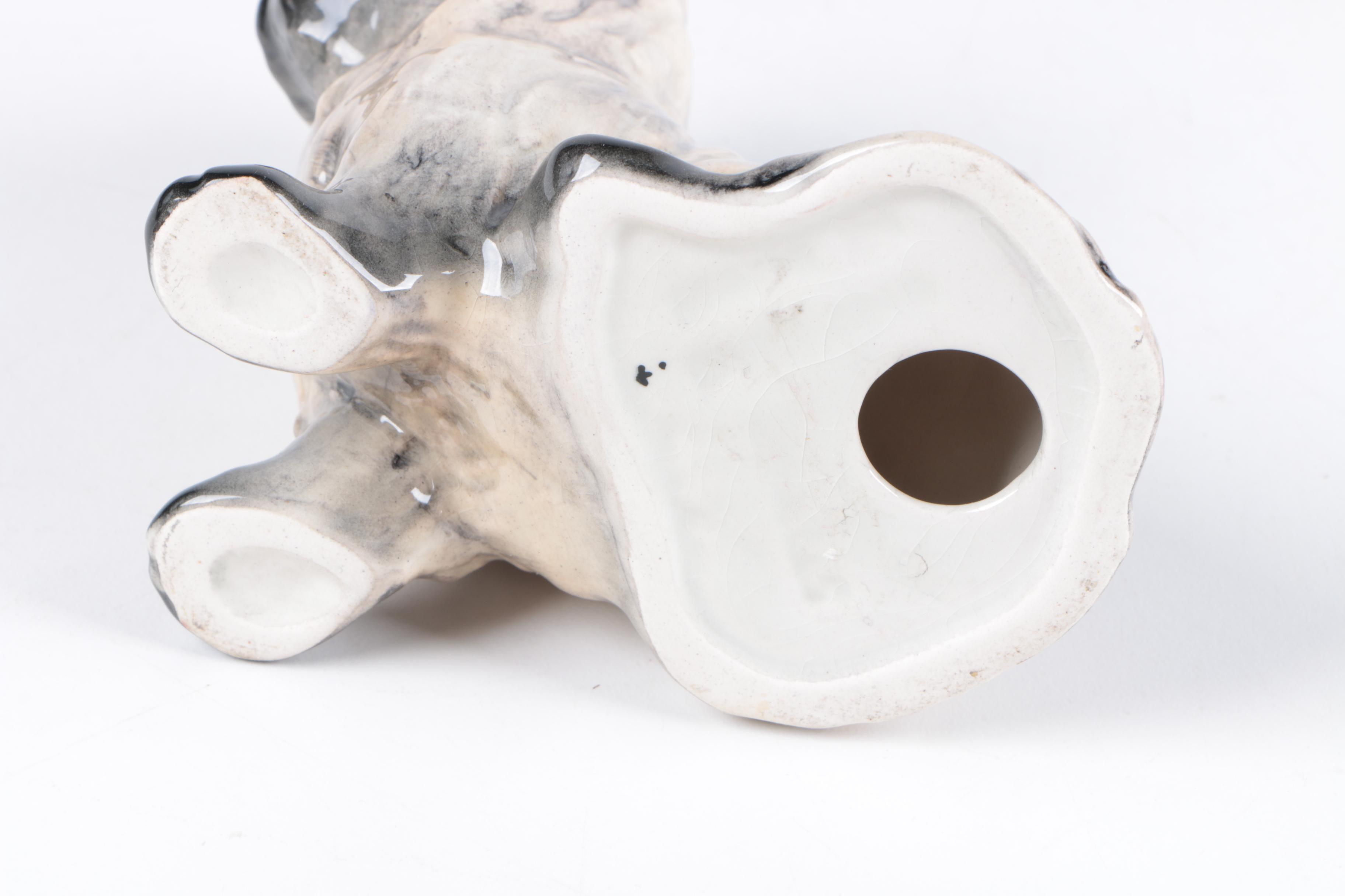 Ceramic and Porcelain Dog Figurines Including Royal Doulton