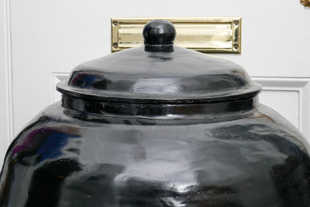 Papier Mache Black Jar and White Ceramic Vase