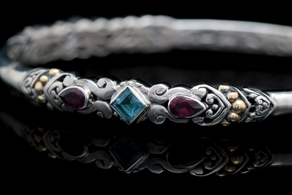 Sterling Silver, 18K Yellow Gold, Blue Topaz and Rhodolite Bangle Bracelet