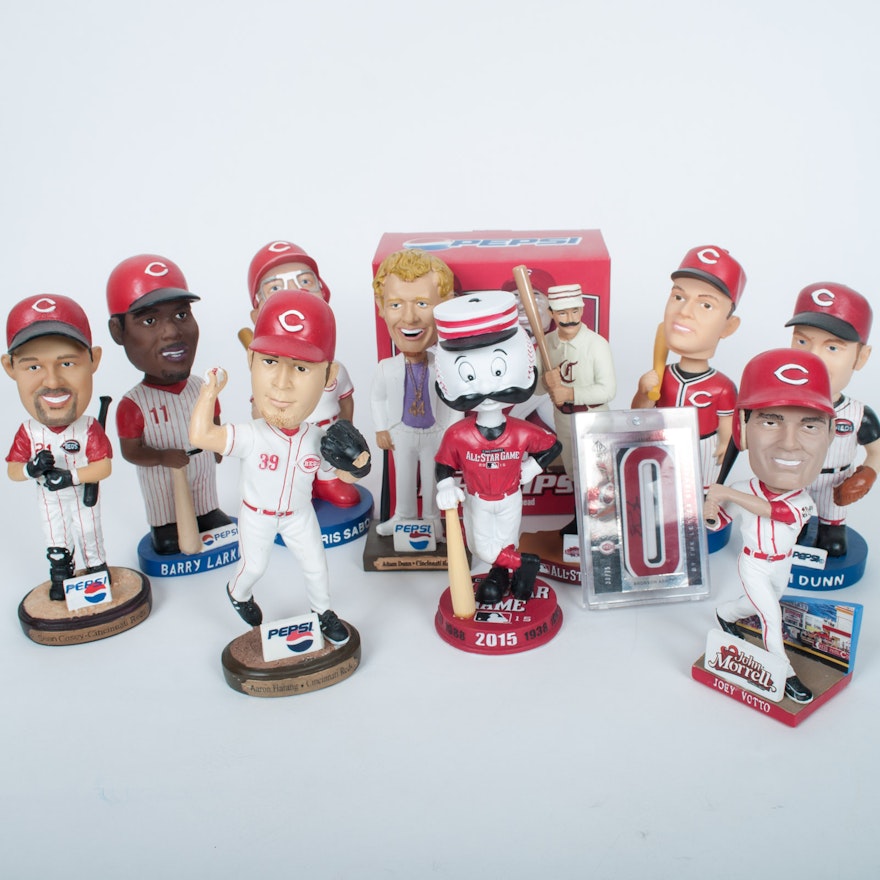 Assortment of Cincinnati Reds Bobble Heads and Memorabilia