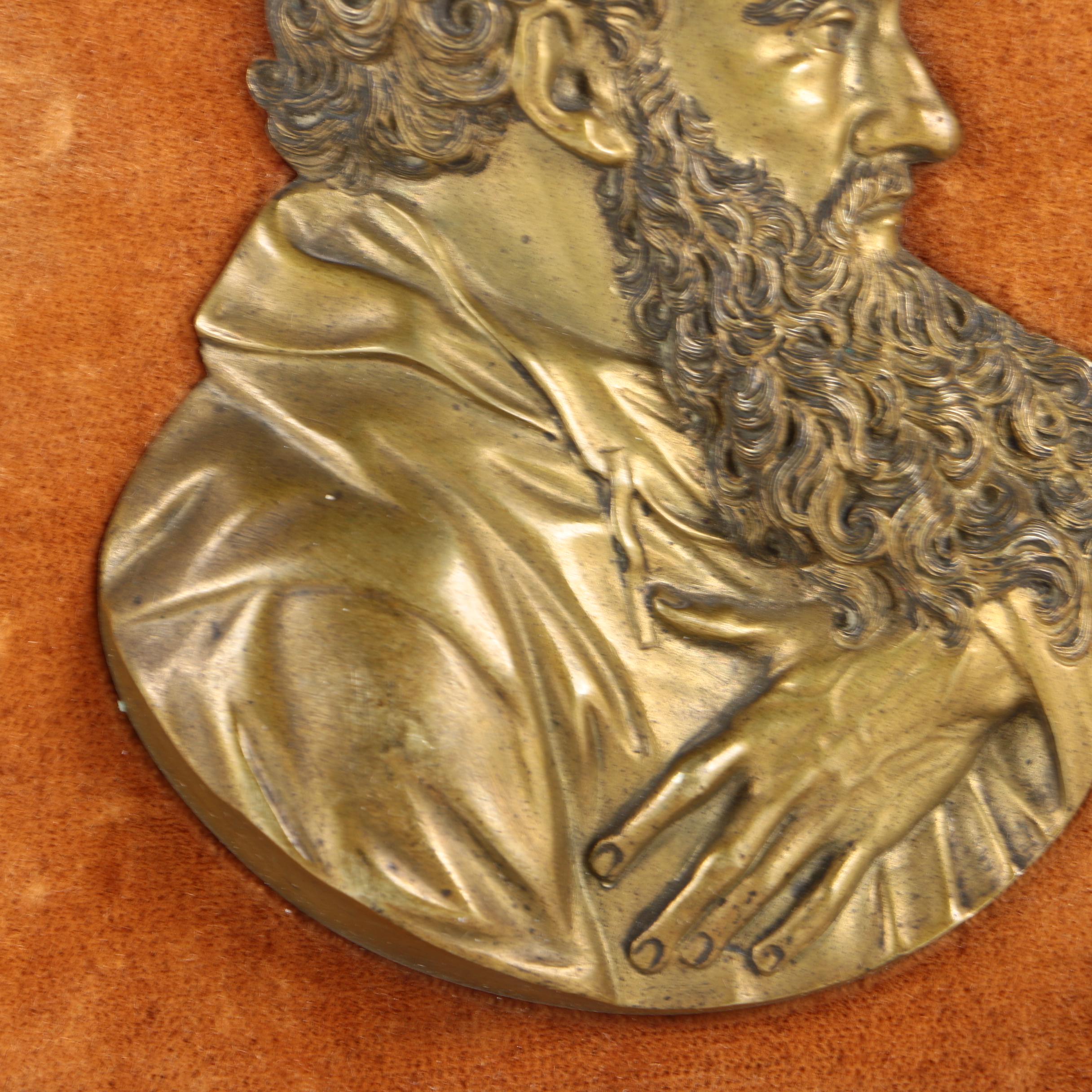 Metal Relief Portraits of Men