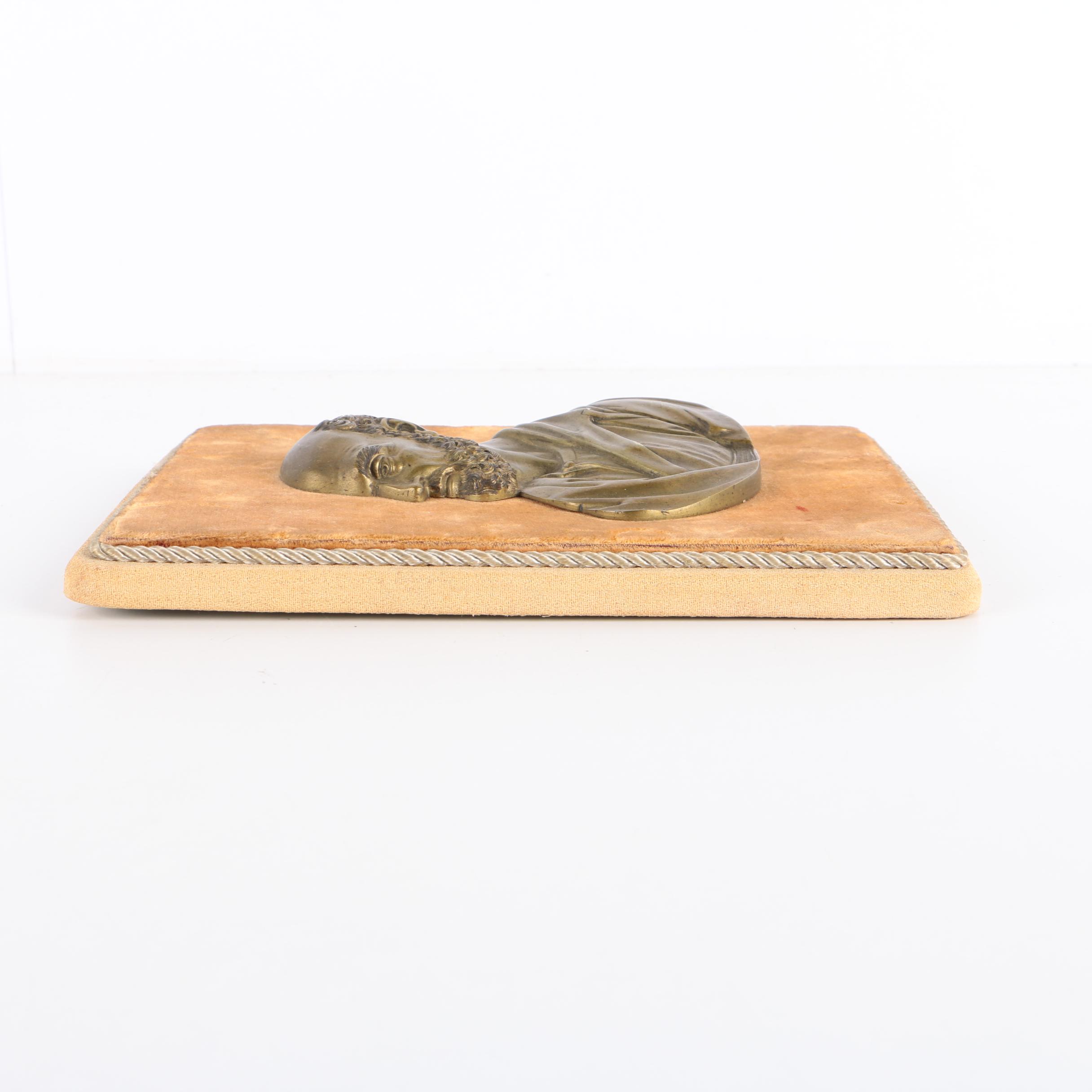 Metal Relief Portraits of Men