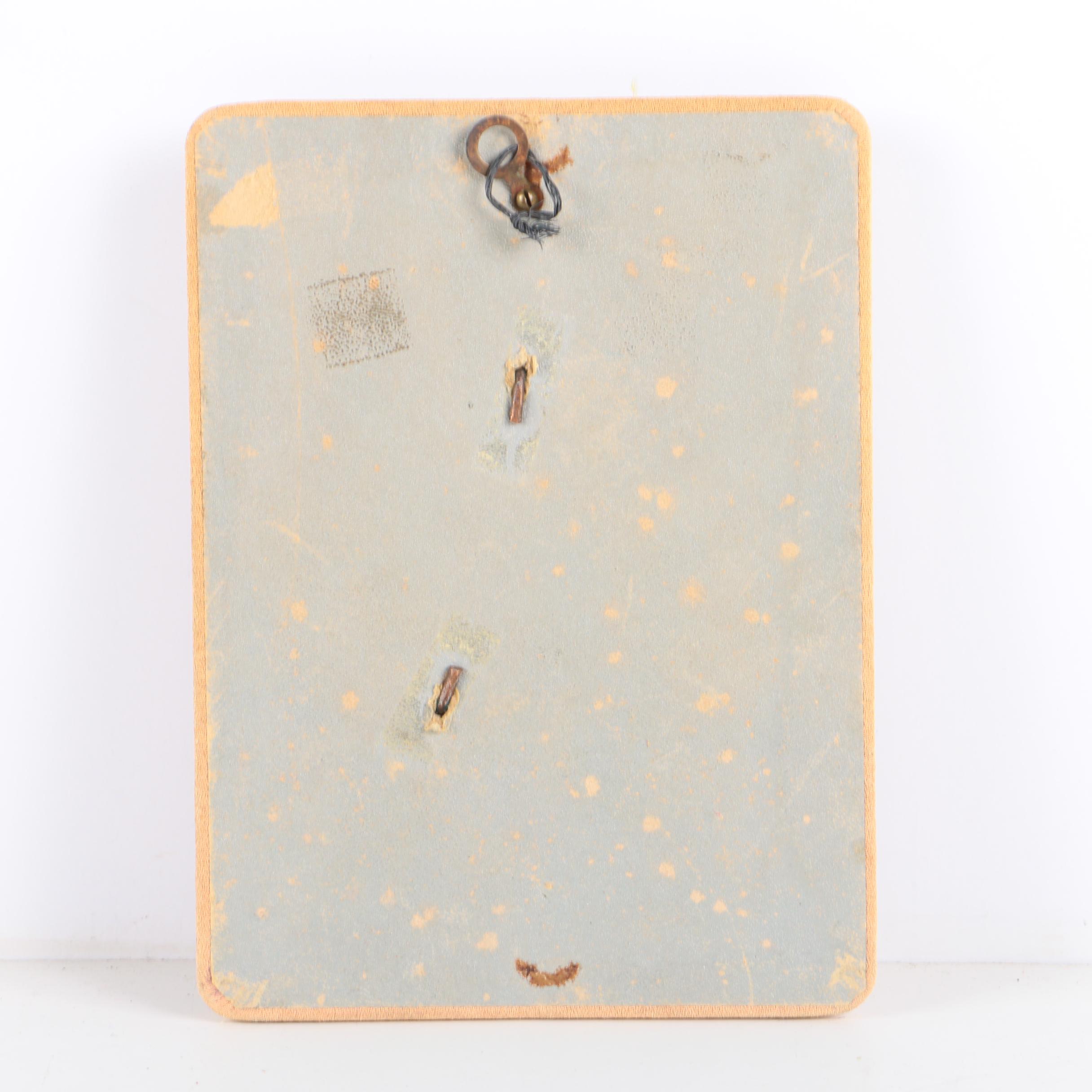 Metal Relief Portraits of Men