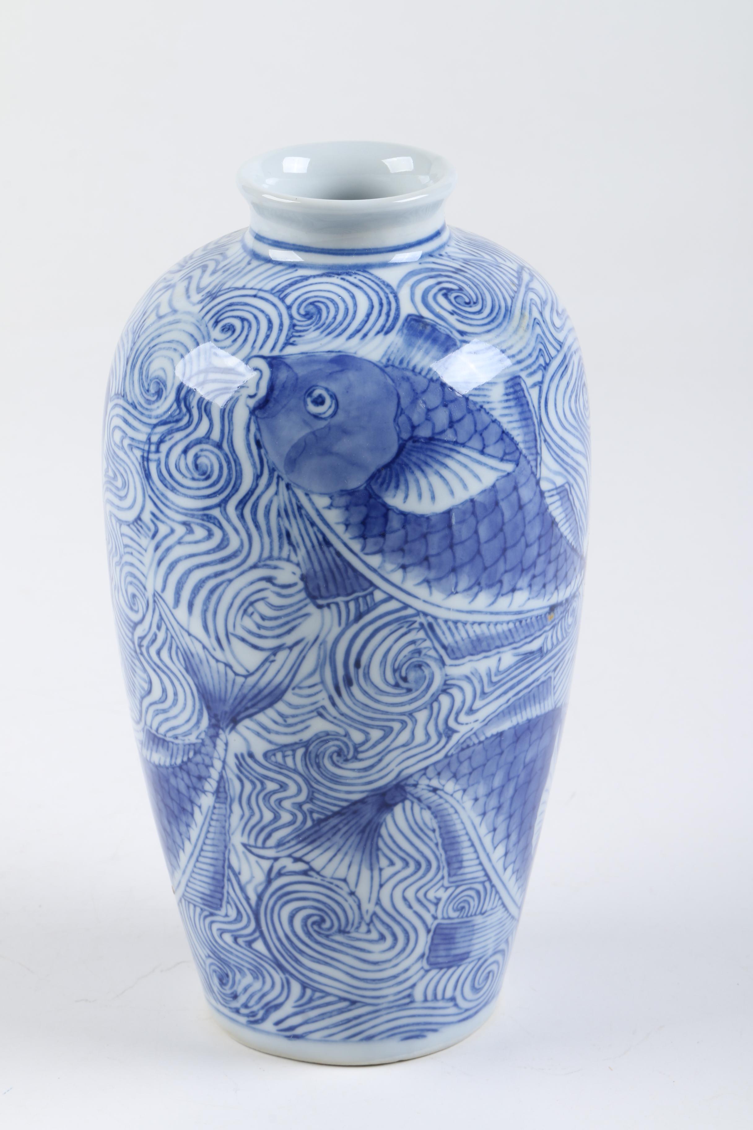 Assorted Blue and White Serveware and Vases