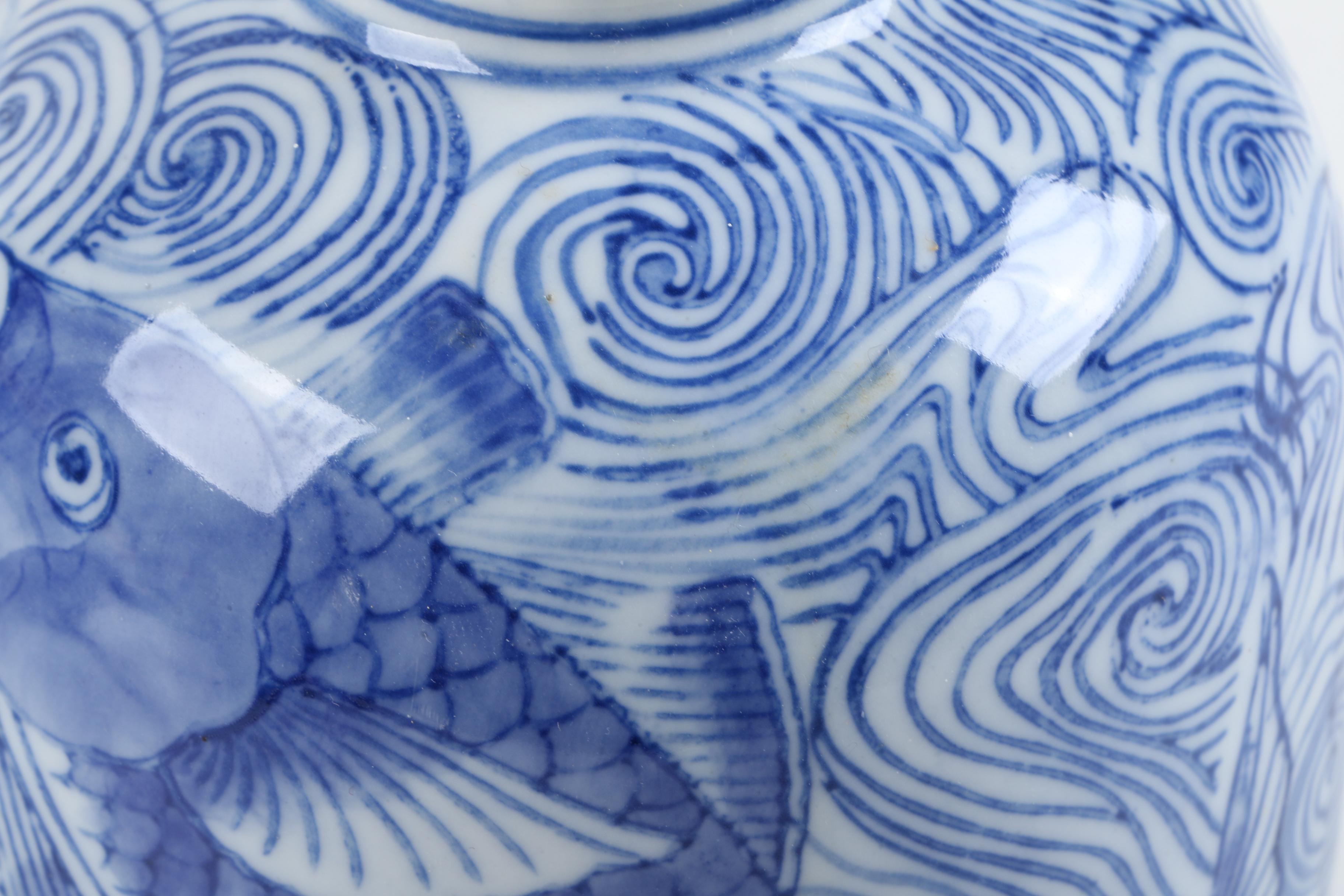 Assorted Blue and White Serveware and Vases