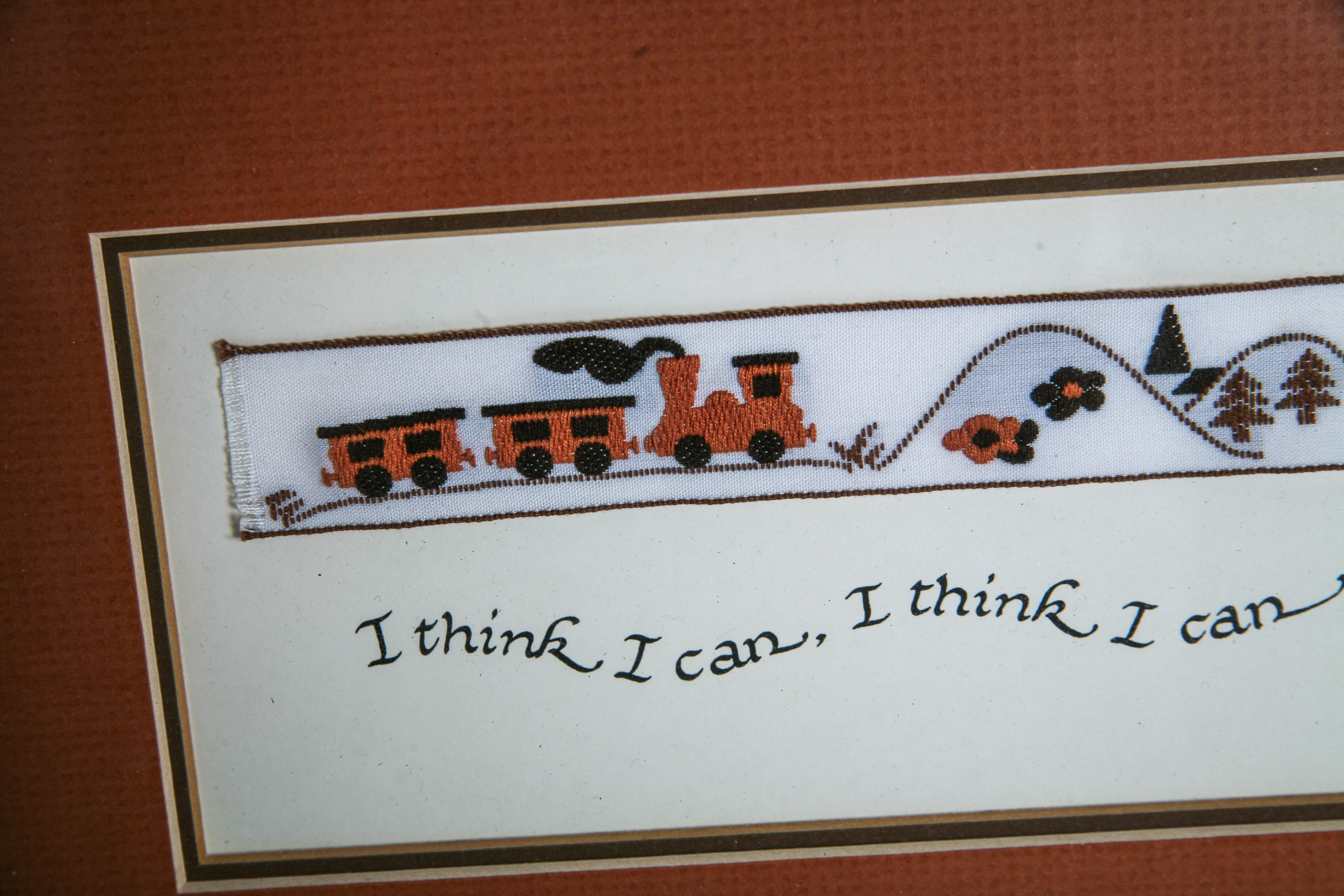 Embroidered Ribbon Depicting the Little Engine That Could